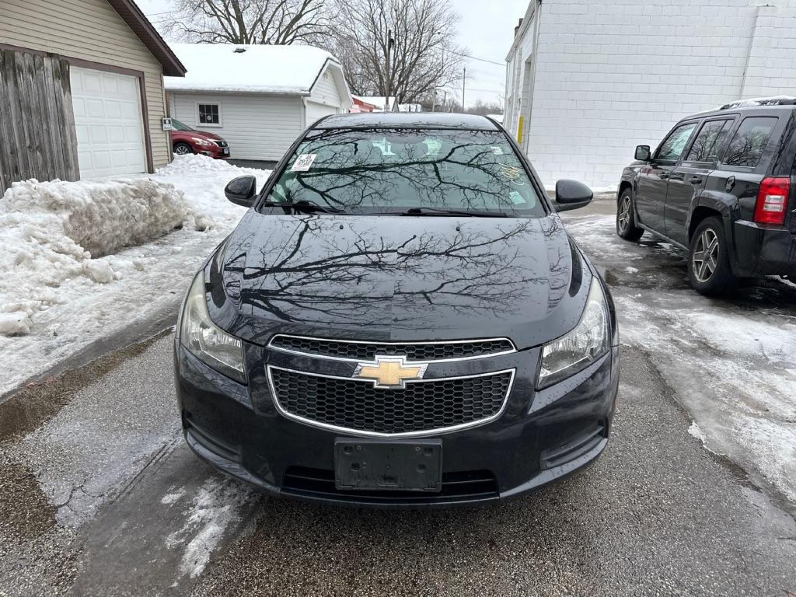 2012 BLACK CHEVROLET CRUZE LT (1G1PF5SC1C7) with an 1.4L engine, Automatic transmission, located at 1708 Broadway, Rockford, IL, 61104, (815) 397-5010, 42.252522, -89.069359 - Photo #5