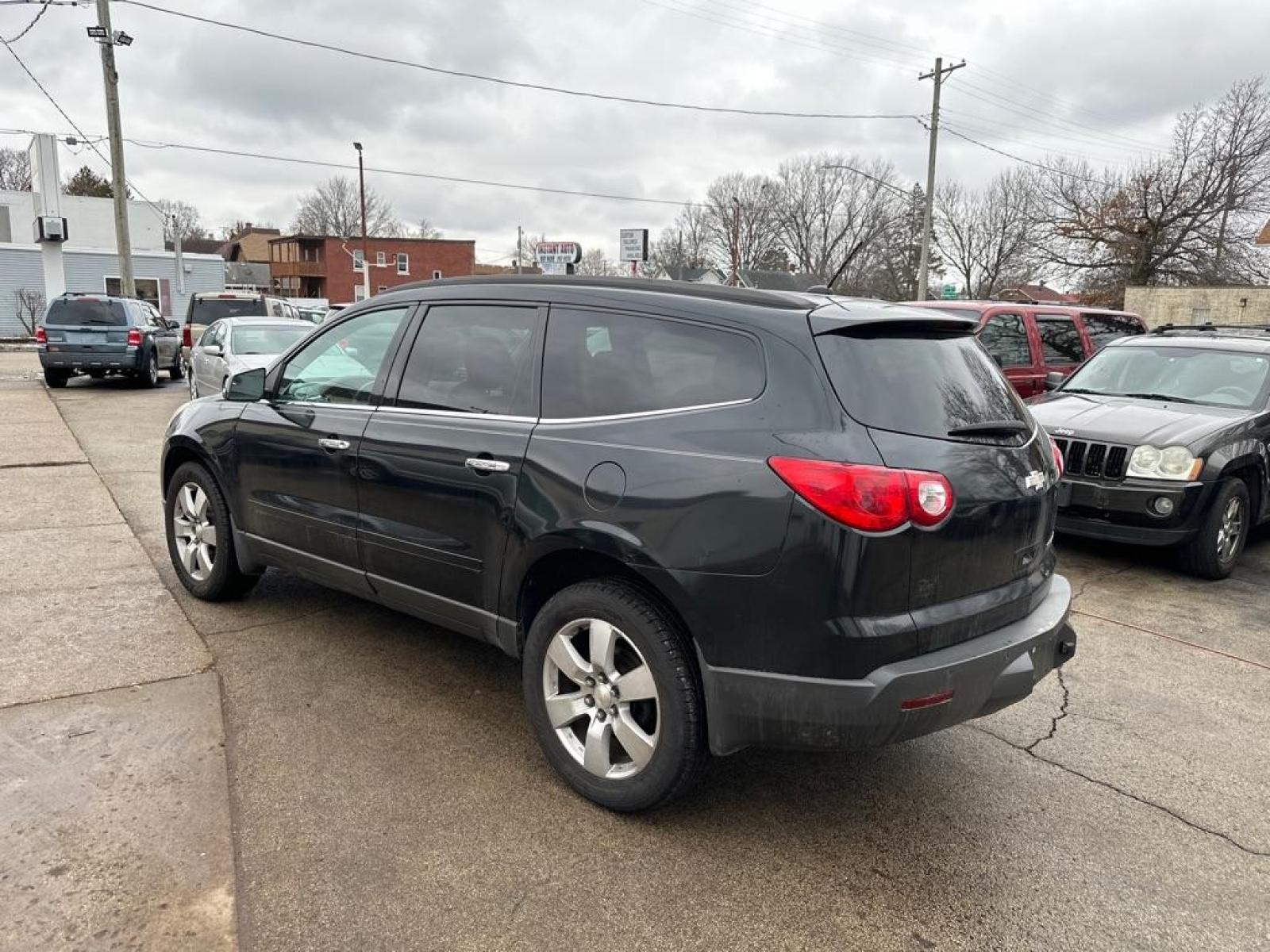 2011 BLACK CHEVROLET TRAVERSE LT (1GNKRGED1BJ) with an 3.6L engine, Automatic transmission, located at 1708 Broadway, Rockford, IL, 61104, (815) 397-5010, 42.252522, -89.069359 - Photo #1