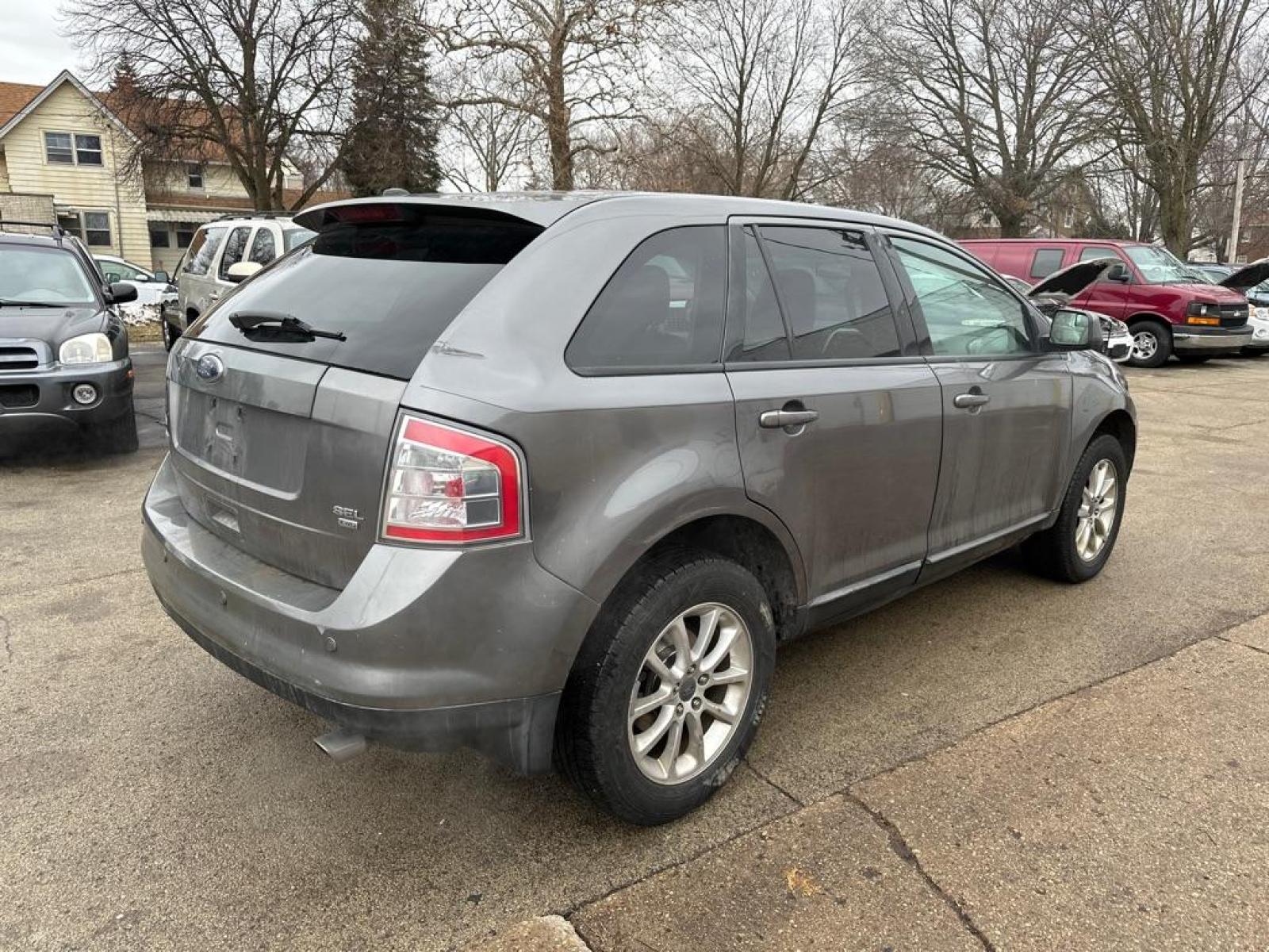 2010 GRAY FORD EDGE SEL (2FMDK4JC6AB) with an 3.5L engine, Automatic transmission, located at 1708 Broadway, Rockford, IL, 61104, (815) 397-5010, 42.252522, -89.069359 - Photo #2