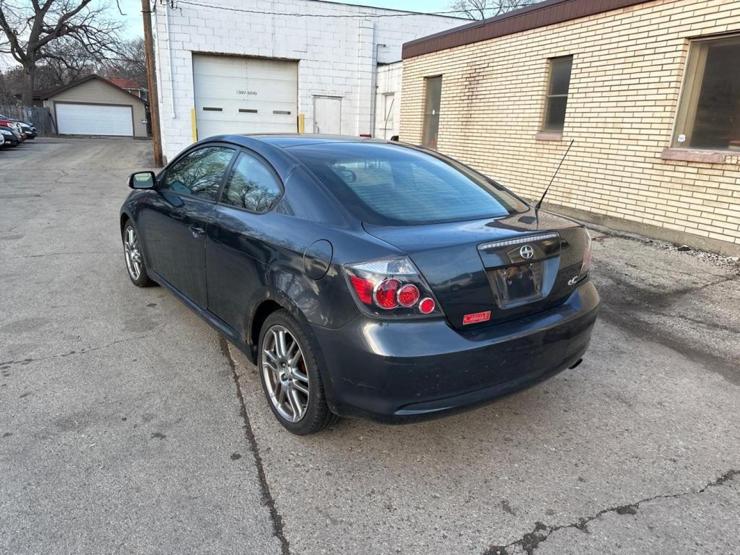2009 BLACK SCION TC HB (JTKDE167090) with an 2.4L engine, Automatic transmission, located at 1708 Broadway, Rockford, IL, 61104, (815) 397-5010, 42.252522, -89.069359 - Photo#1
