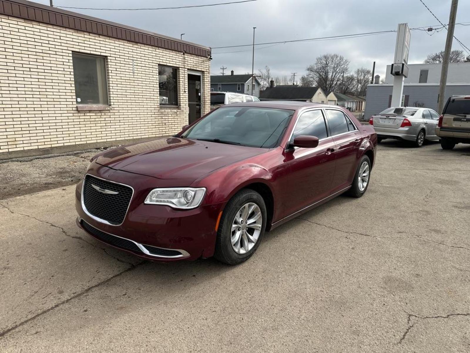 2016 RED CHRYSLER 300 LIMITED (2C3CCAAG2GH) with an 3.6L engine, Automatic transmission, located at 1708 Broadway, Rockford, IL, 61104, (815) 397-5010, 42.252522, -89.069359 - Photo #0