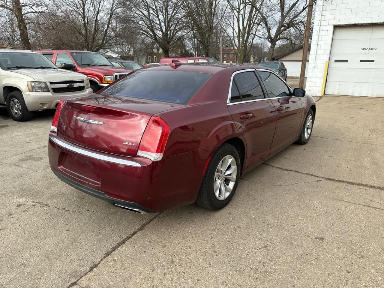 2016 RED CHRYSLER 300 LIMITED (2C3CCAAG2GH) with an 3.6L engine, Automatic transmission, located at 1708 Broadway, Rockford, IL, 61104, (815) 397-5010, 42.252522, -89.069359 - Photo #2