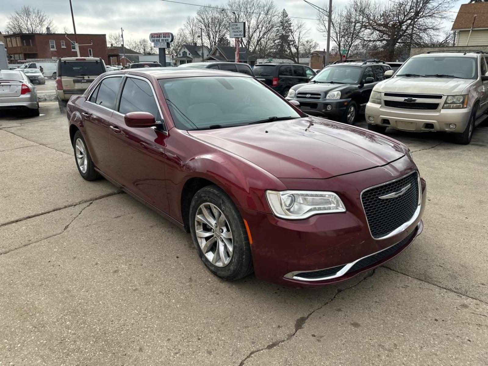 2016 RED CHRYSLER 300 LIMITED (2C3CCAAG2GH) with an 3.6L engine, Automatic transmission, located at 1708 Broadway, Rockford, IL, 61104, (815) 397-5010, 42.252522, -89.069359 - Photo #3