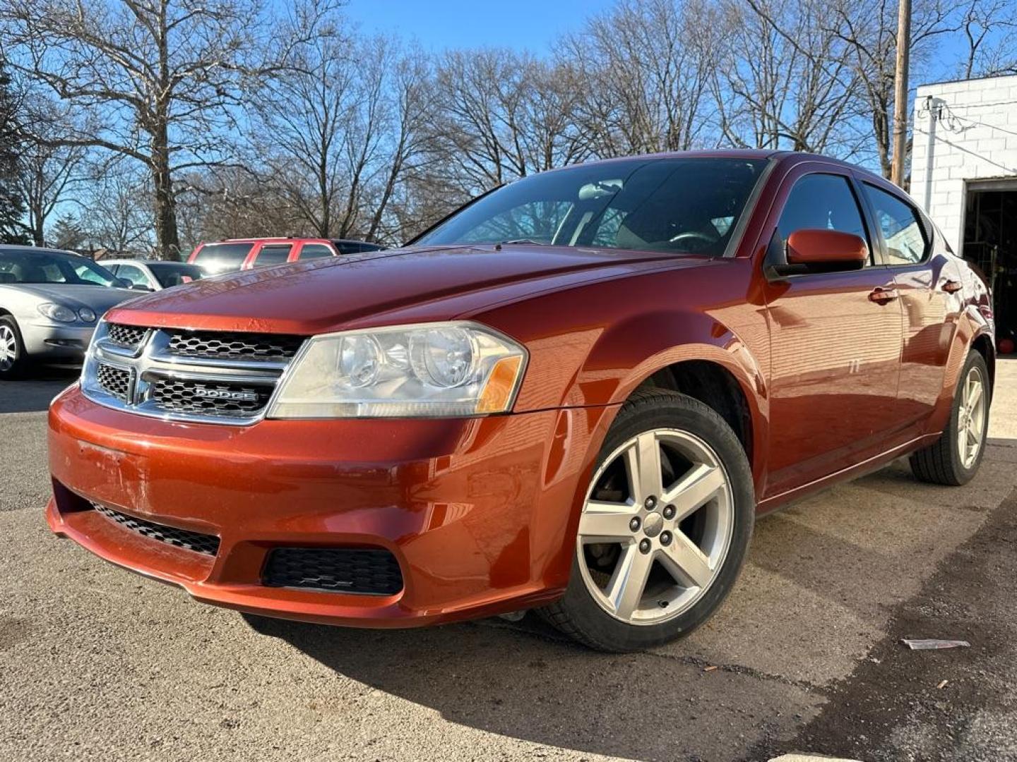 2012 ORANGE DODGE AVENGER SXT (1C3CDZCB0CN) with an 2.4L engine, Automatic transmission, located at 1708 Broadway, Rockford, IL, 61104, (815) 397-5010, 42.252522, -89.069359 - Photo#0
