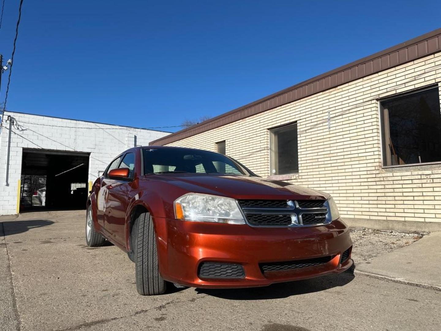 2012 ORANGE DODGE AVENGER SXT (1C3CDZCB0CN) with an 2.4L engine, Automatic transmission, located at 1708 Broadway, Rockford, IL, 61104, (815) 397-5010, 42.252522, -89.069359 - Photo#4