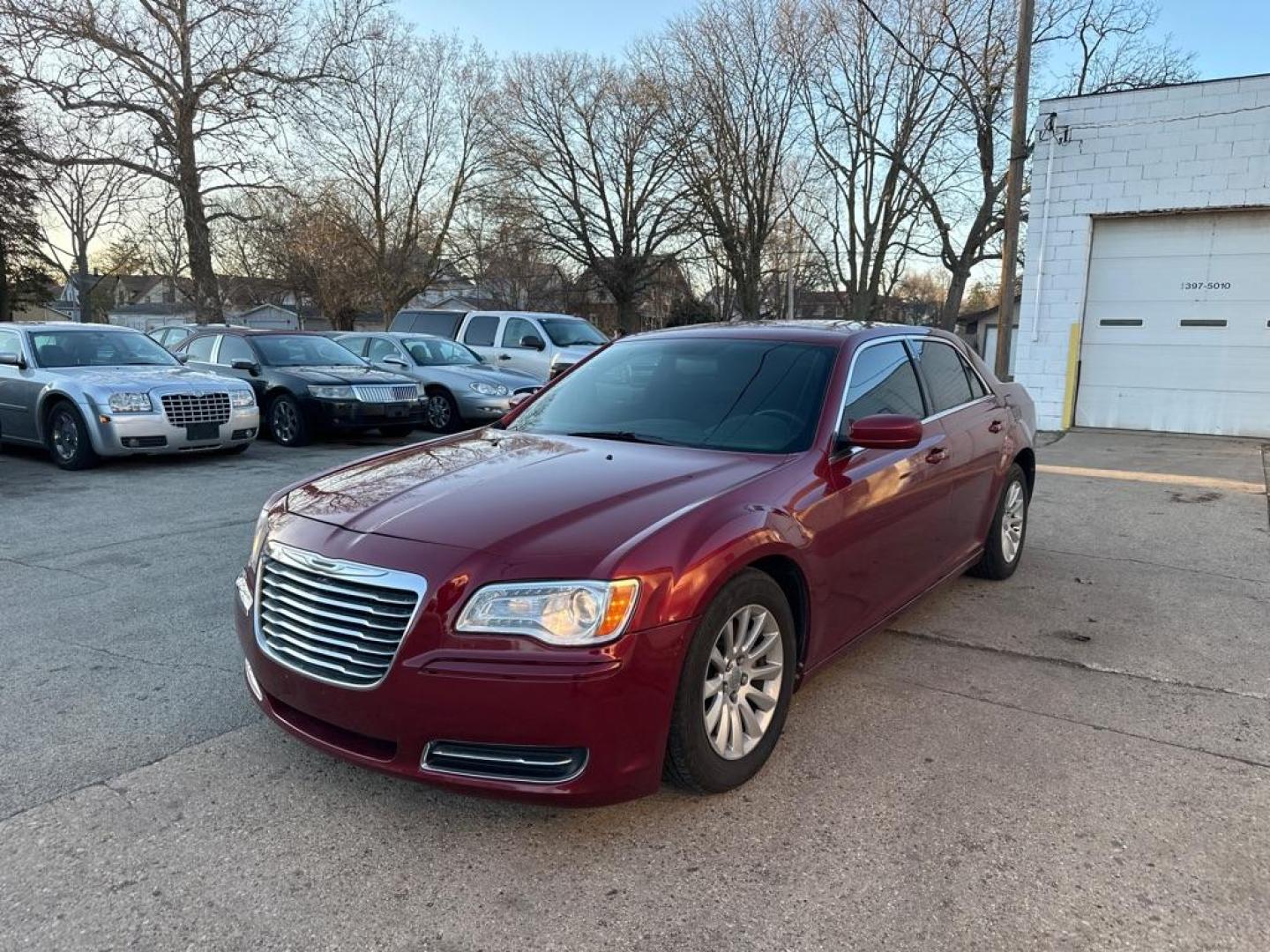 2013 RED CHRYSLER 300 (2C3CCAAG7DH) with an 3.6L engine, Automatic transmission, located at 1708 Broadway, Rockford, IL, 61104, (815) 397-5010, 42.252522, -89.069359 - Photo#0