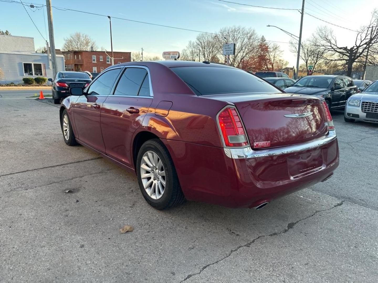 2013 RED CHRYSLER 300 (2C3CCAAG7DH) with an 3.6L engine, Automatic transmission, located at 1708 Broadway, Rockford, IL, 61104, (815) 397-5010, 42.252522, -89.069359 - Photo#1