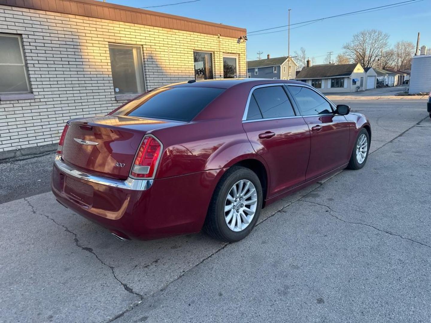2013 RED CHRYSLER 300 (2C3CCAAG7DH) with an 3.6L engine, Automatic transmission, located at 1708 Broadway, Rockford, IL, 61104, (815) 397-5010, 42.252522, -89.069359 - Photo#3