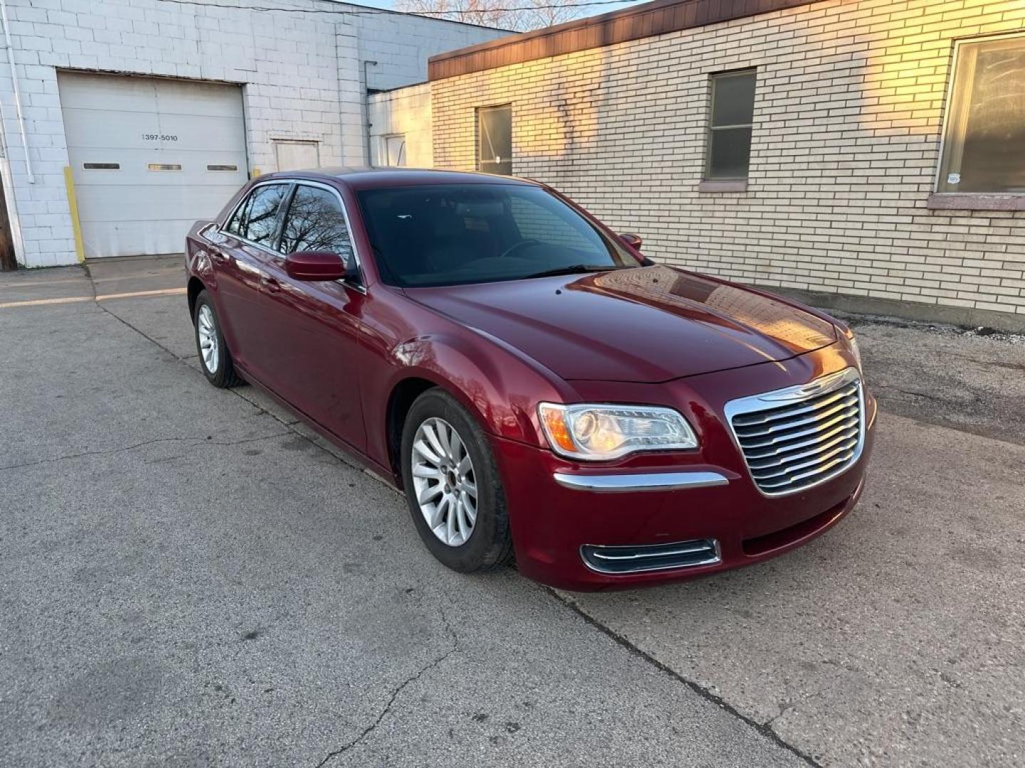 2013 RED CHRYSLER 300 (2C3CCAAG7DH) with an 3.6L engine, Automatic transmission, located at 1708 Broadway, Rockford, IL, 61104, (815) 397-5010, 42.252522, -89.069359 - Photo#4