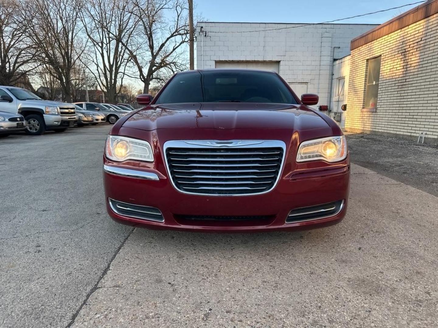2013 RED CHRYSLER 300 (2C3CCAAG7DH) with an 3.6L engine, Automatic transmission, located at 1708 Broadway, Rockford, IL, 61104, (815) 397-5010, 42.252522, -89.069359 - Photo#5