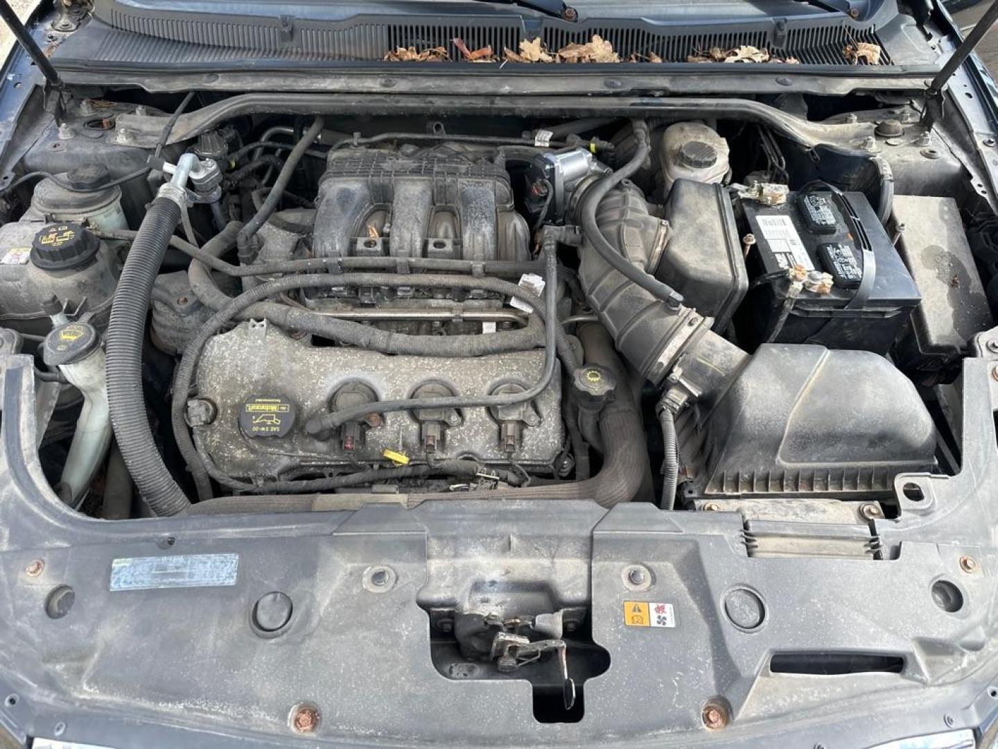 2010 BLACK FORD TAURUS SE (1FAHP2DW4AG) with an 3.5L engine, Automatic transmission, located at 1708 Broadway, Rockford, IL, 61104, (815) 397-5010, 42.252522, -89.069359 - Photo#11