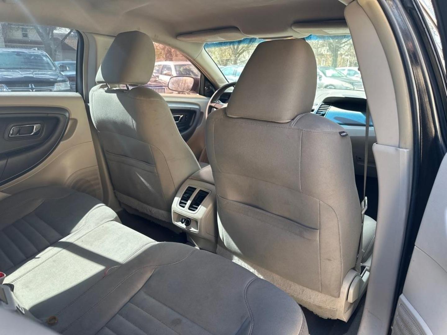 2010 BLACK FORD TAURUS SE (1FAHP2DW4AG) with an 3.5L engine, Automatic transmission, located at 1708 Broadway, Rockford, IL, 61104, (815) 397-5010, 42.252522, -89.069359 - Photo#7