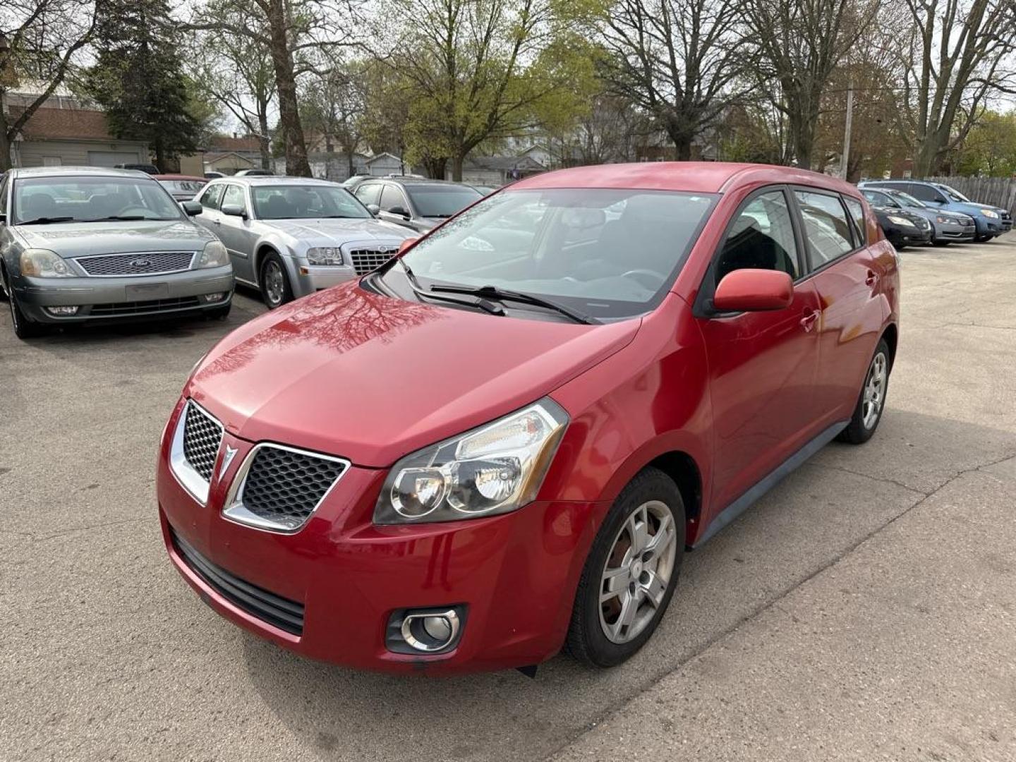 2009 RED PONTIAC VIBE (5Y2SP67019Z) with an 2.4L engine, Automatic transmission, located at 1708 Broadway, Rockford, IL, 61104, (815) 397-5010, 42.252522, -89.069359 - Photo#0