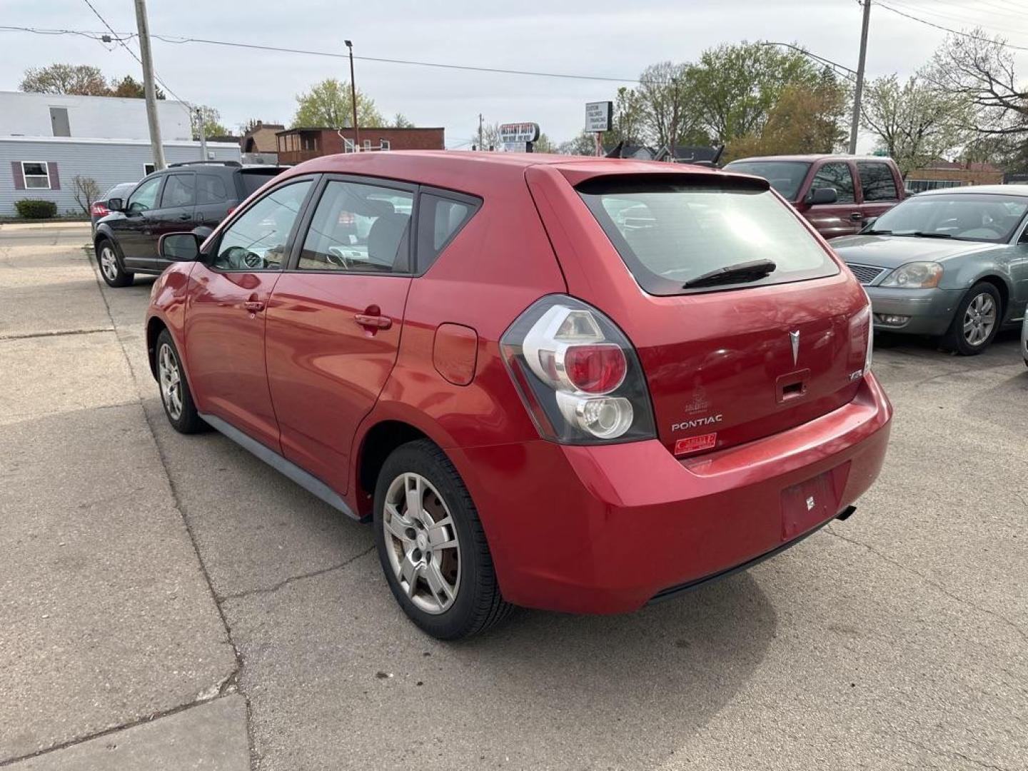 2009 RED PONTIAC VIBE (5Y2SP67019Z) with an 2.4L engine, Automatic transmission, located at 1708 Broadway, Rockford, IL, 61104, (815) 397-5010, 42.252522, -89.069359 - Photo#1