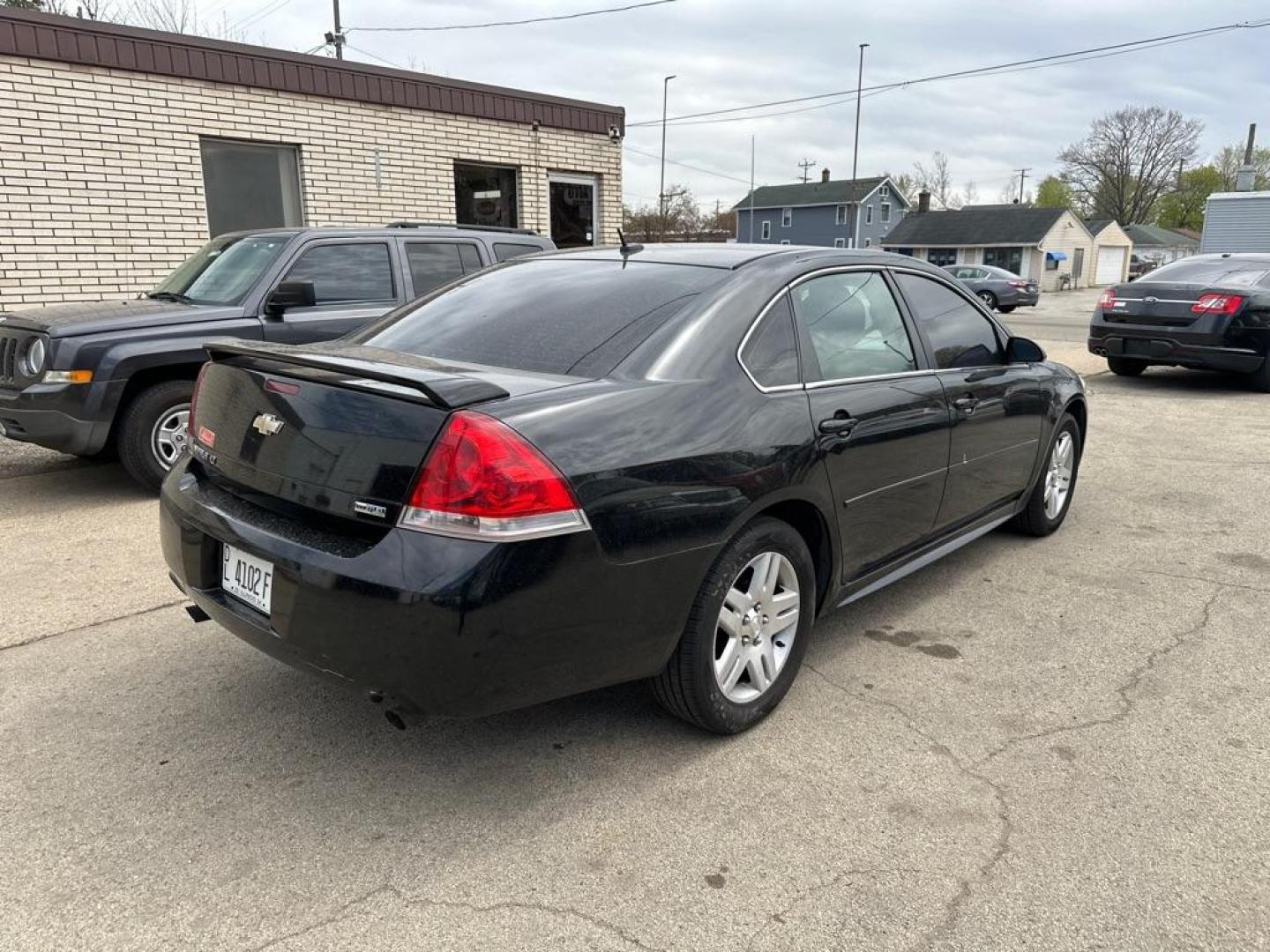 2012 BLACK CHEVROLET IMPALA LT (2G1WG5E3XC1) with an 3.6L engine, Automatic transmission, located at 1708 Broadway, Rockford, IL, 61104, (815) 397-5010, 42.252522, -89.069359 - Photo#3