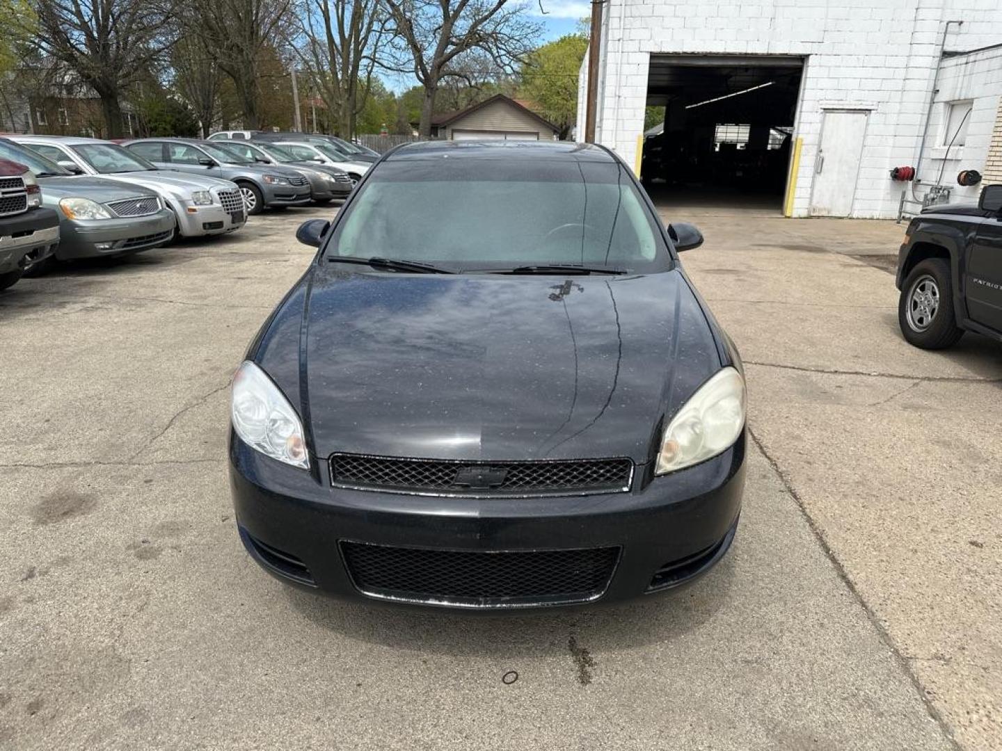 2012 BLACK CHEVROLET IMPALA LT (2G1WG5E3XC1) with an 3.6L engine, Automatic transmission, located at 1708 Broadway, Rockford, IL, 61104, (815) 397-5010, 42.252522, -89.069359 - Photo#5