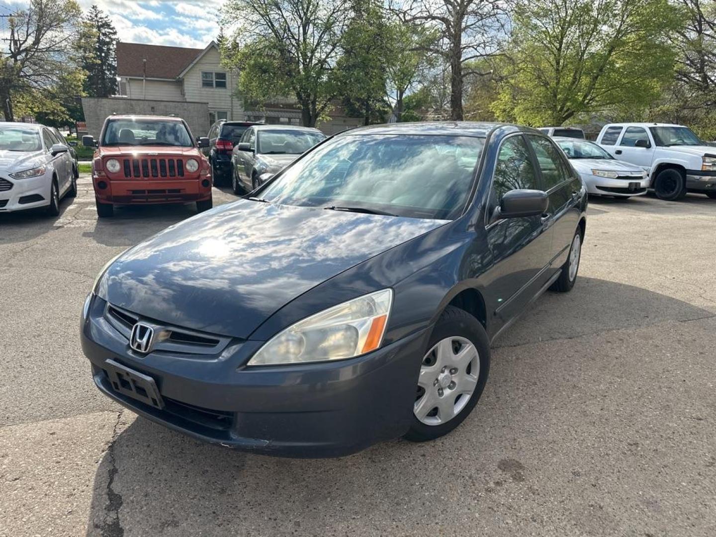 2005 BLUE HONDA ACCORD LX (1HGCM56445A) with an 2.4L engine, Automatic transmission, located at 1708 Broadway, Rockford, IL, 61104, (815) 397-5010, 42.252522, -89.069359 - Photo#0