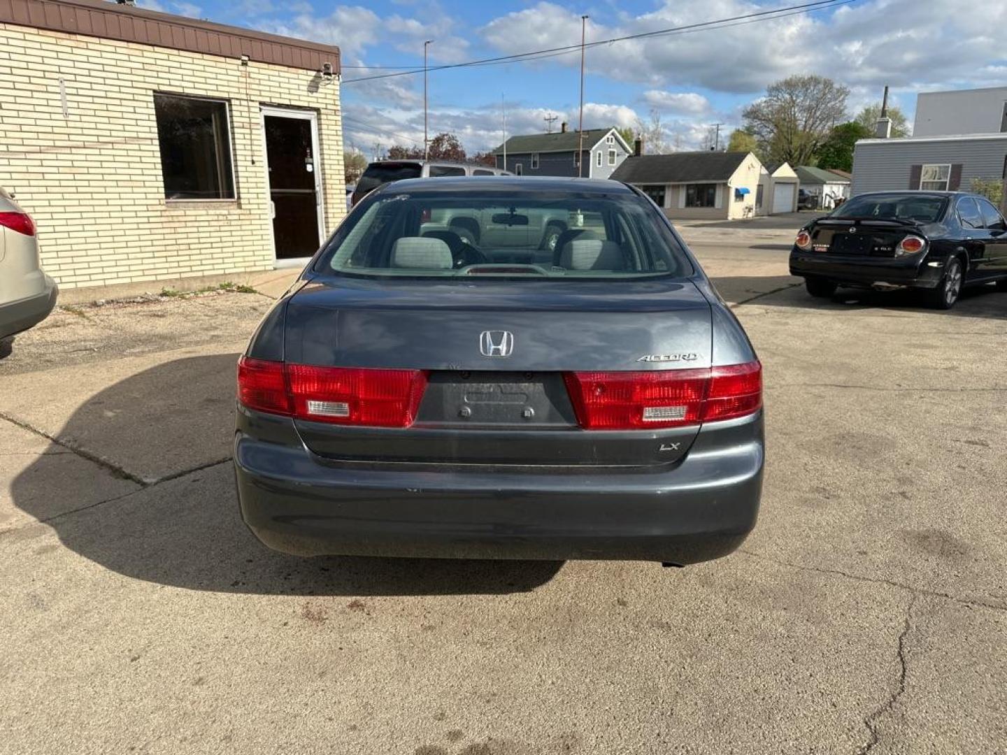 2005 BLUE HONDA ACCORD LX (1HGCM56445A) with an 2.4L engine, Automatic transmission, located at 1708 Broadway, Rockford, IL, 61104, (815) 397-5010, 42.252522, -89.069359 - Photo#2