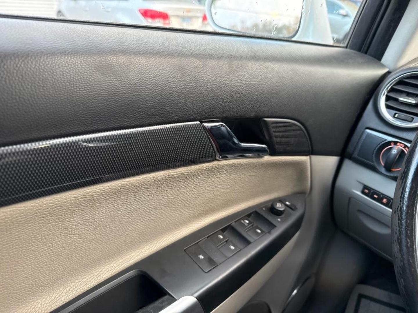 2009 WHITE SATURN VUE XE (3GSCL33P59S) with an 2.4L engine, Automatic transmission, located at 1708 Broadway, Rockford, IL, 61104, (815) 397-5010, 42.252522, -89.069359 - Photo#6