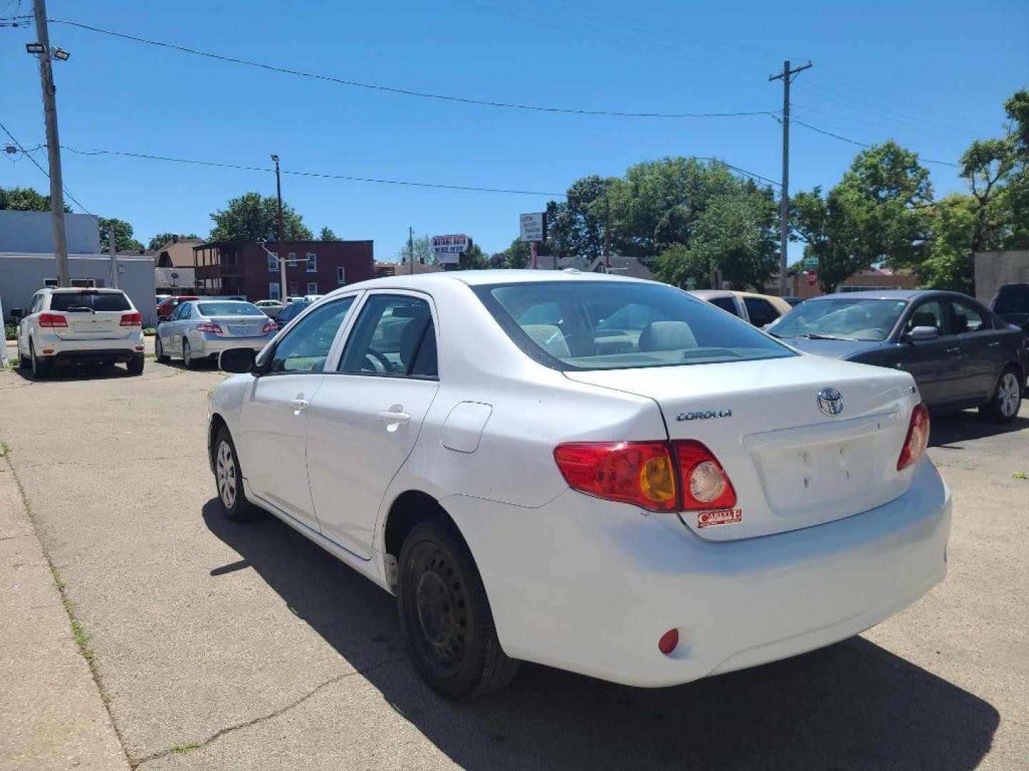2010 WHITE TOYOTA COROLLA BASE (1NXBU4EE7AZ) with an 1.8L engine, Automatic transmission, located at 1708 Broadway, Rockford, IL, 61104, (815) 397-5010, 42.252522, -89.069359 - Photo#3