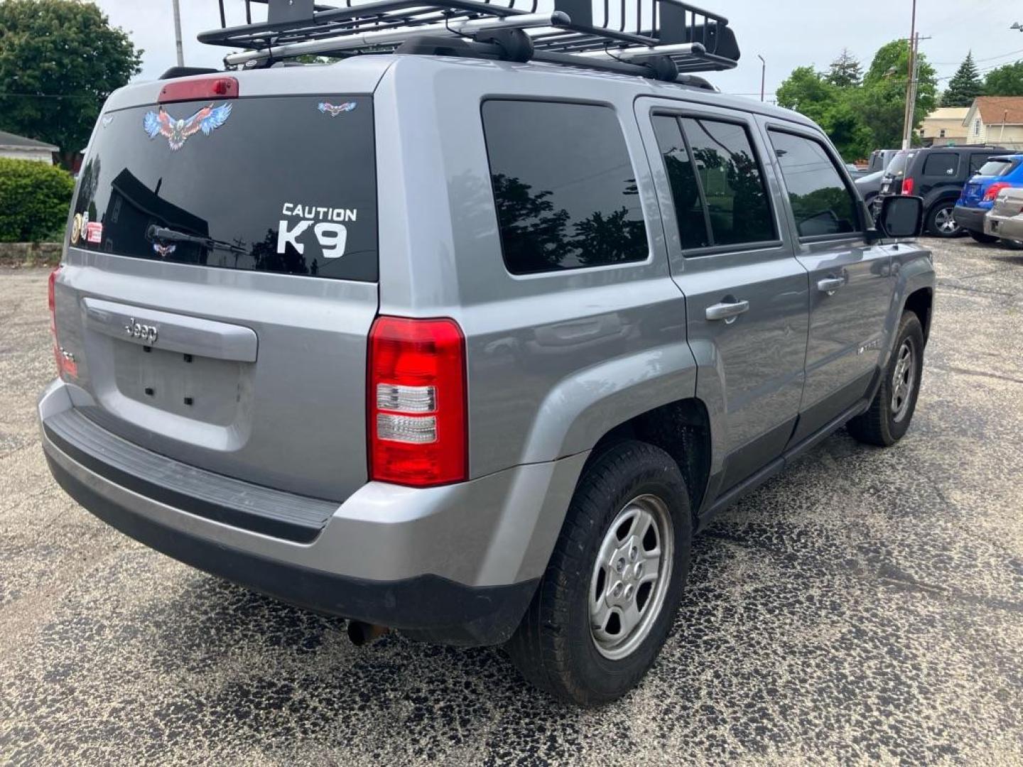 2016 GRAY JEEP PATRIOT SPORT (1C4NJRBB2GD) with an 2.4L engine, Continuously Variable transmission, located at 1708 Broadway, Rockford, IL, 61104, (815) 397-5010, 42.252522, -89.069359 - Photo#2