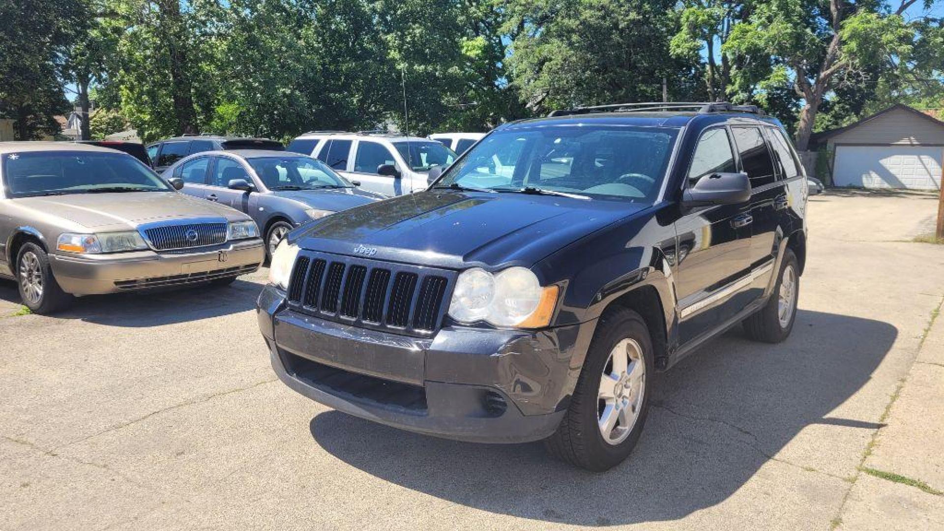 2010 BLACK JEEP GRAND CHEROKEE LAREDO (1J4PR4GKXAC) with an 3.7L engine, Automatic transmission, located at 1708 Broadway, Rockford, IL, 61104, (815) 397-5010, 42.252522, -89.069359 - Photo#0