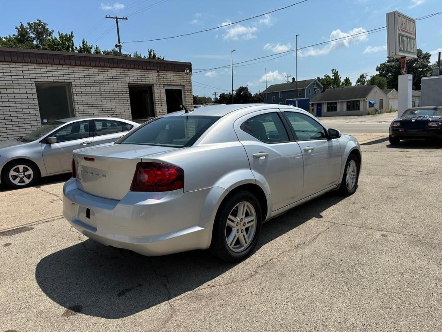 2011 SILVER DODGE AVENGER MAINSTREET (1B3BD1FB1BN) with an 2.4L engine, Automatic transmission, located at 1708 Broadway, Rockford, IL, 61104, (815) 397-5010, 42.252522, -89.069359 - Photo#2