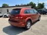 2013 ORANGE DODGE JOURNEY SE (3C4PDCAB0DT) with an 2.4L engine, Automatic transmission, located at 1708 Broadway, Rockford, IL, 61104, (815) 397-5010, 42.252522, -89.069359 - Photo#2