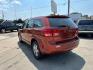 2013 ORANGE DODGE JOURNEY SE (3C4PDCAB0DT) with an 2.4L engine, Automatic transmission, located at 1708 Broadway, Rockford, IL, 61104, (815) 397-5010, 42.252522, -89.069359 - Photo#3
