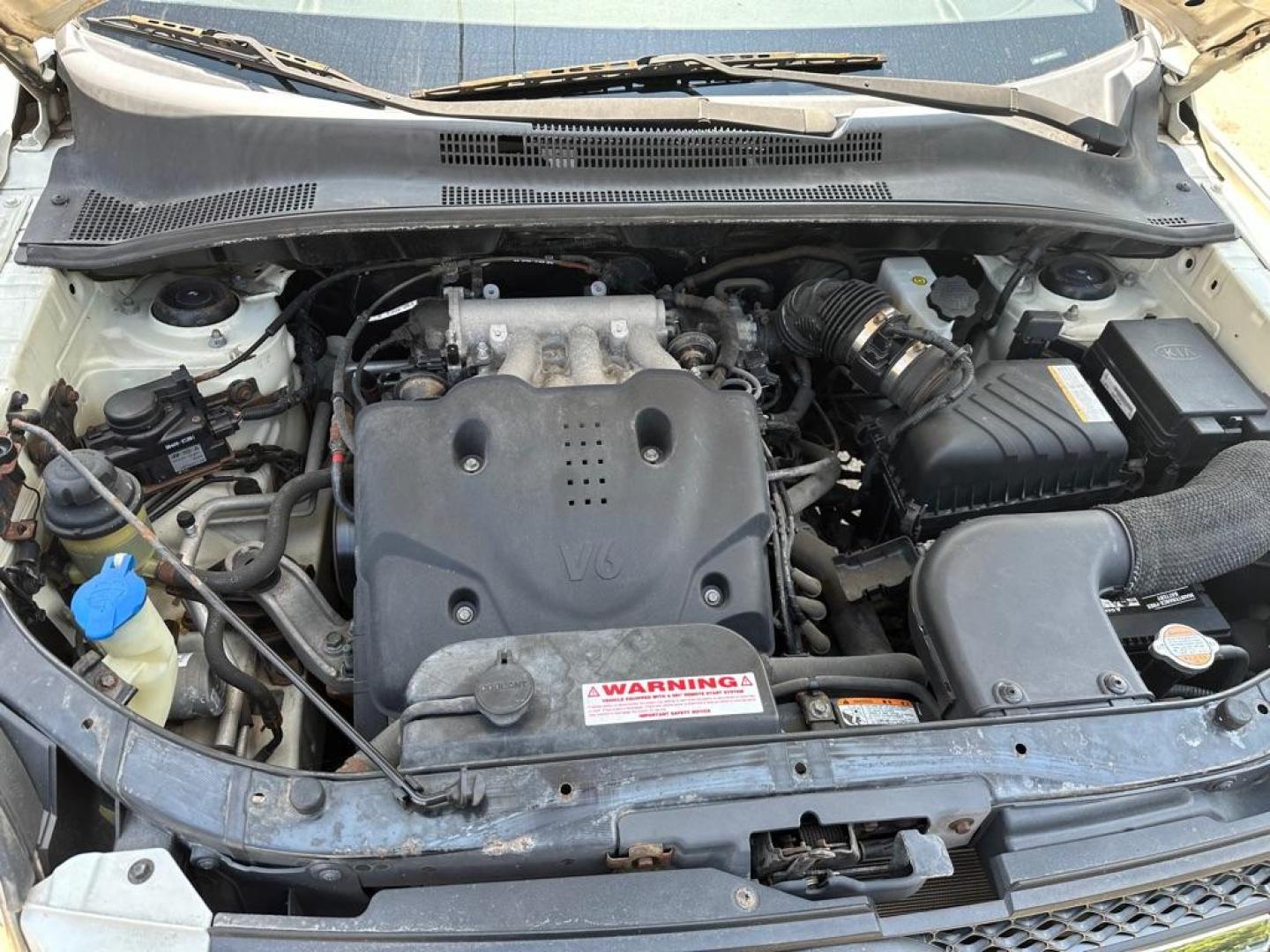 2009 WHITE KIA SPORTAGE LX (KNDJF723X97) with an 2.7L engine, Automatic transmission, located at 1708 Broadway, Rockford, IL, 61104, (815) 397-5010, 42.252522, -89.069359 - Photo#11