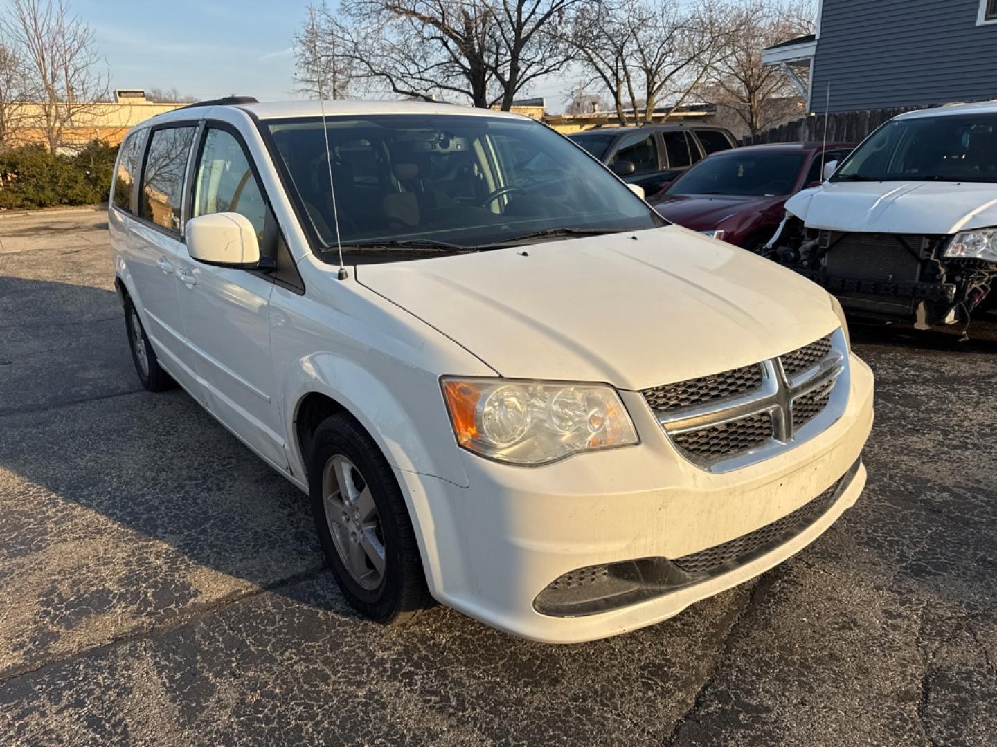 2012 WHITE DODGE GRAND CARAVAN SXT (2C4RDGCG4CR) with an 3.6L engine, Automatic transmission, located at 1708 Broadway, Rockford, IL, 61104, (815) 397-5010, 42.252522, -89.069359- Photo#1