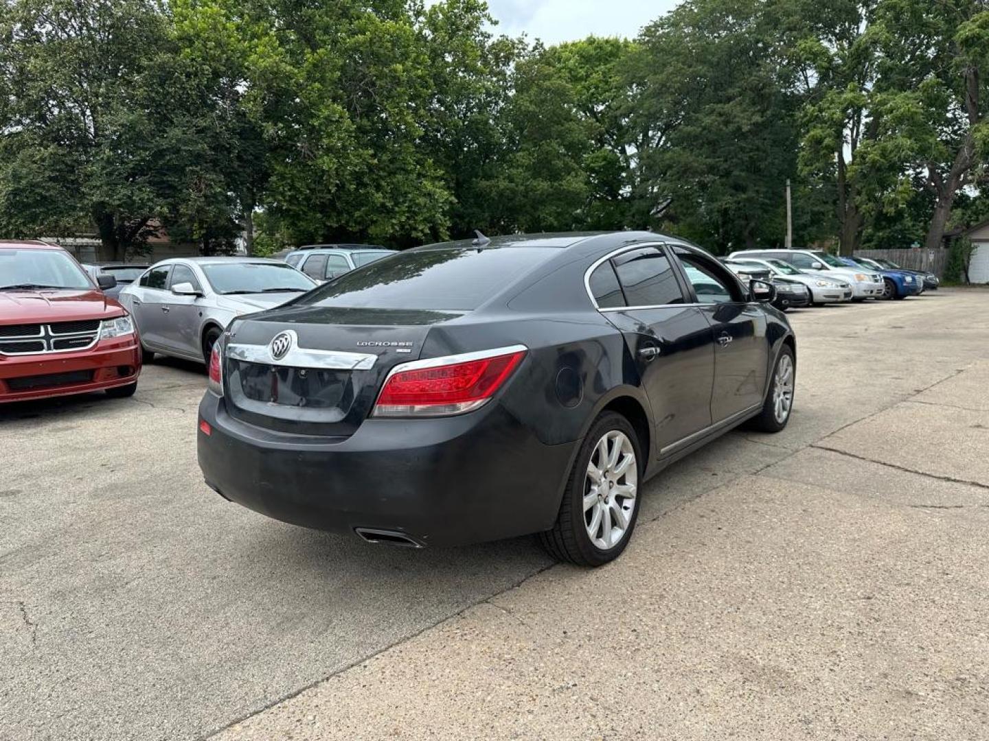 2011 BLACK BUICK LACROSSE CXS (1G4GE5ED5BF) with an 3.6L engine, Automatic transmission, located at 1708 Broadway, Rockford, IL, 61104, (815) 397-5010, 42.252522, -89.069359 - Photo#2