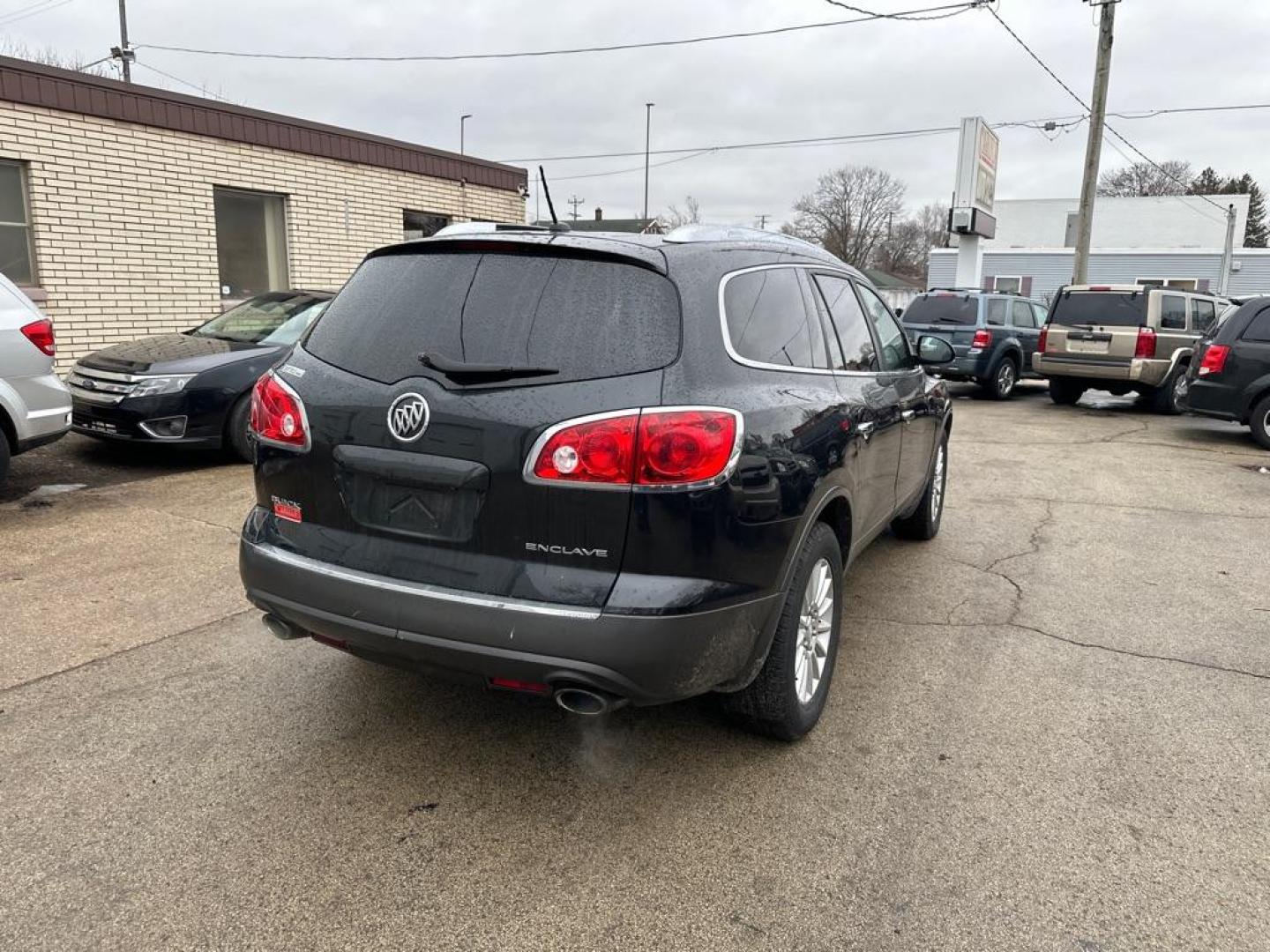 2010 BLACK BUICK ENCLAVE CX (5GALVAED2AJ) with an 3.6L engine, Automatic transmission, located at 1708 Broadway, Rockford, IL, 61104, (815) 397-5010, 42.252522, -89.069359 - Photo#2