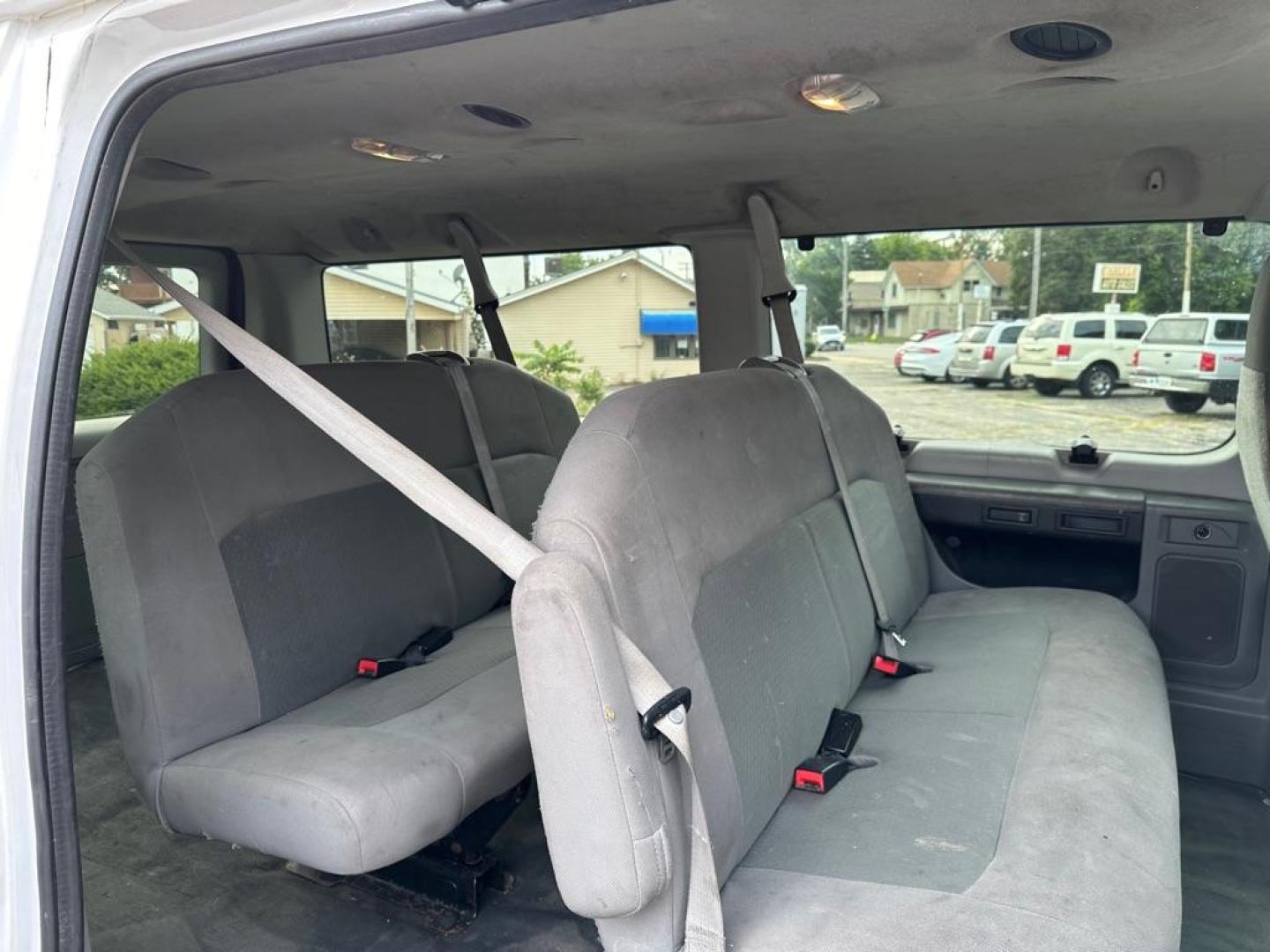 2013 WHITE FORD ECONOLINE E150 WAGON (1FMNE1BWXDD) with an 4.6L engine, Automatic transmission, located at 1708 Broadway, Rockford, IL, 61104, (815) 397-5010, 42.252522, -89.069359 - Photo#9