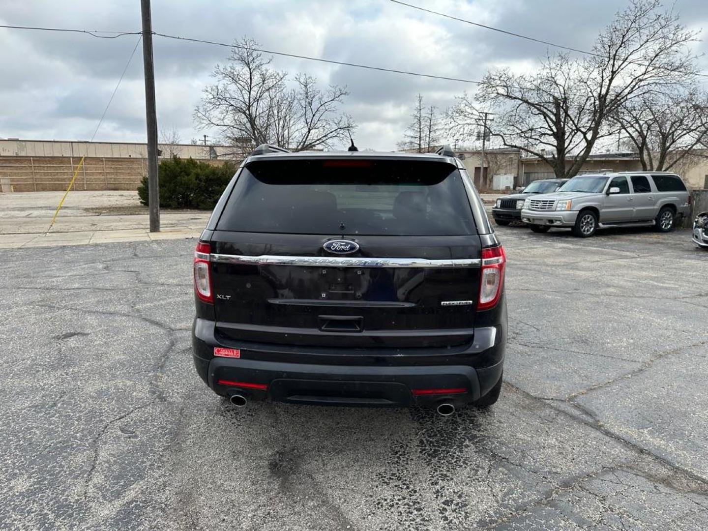 2013 BLACK FORD EXPLORER XLT (1FM5K7D82DG) with an 3.5L engine, Automatic transmission, located at 1708 Broadway, Rockford, IL, 61104, (815) 397-5010, 42.252522, -89.069359 - Photo#5