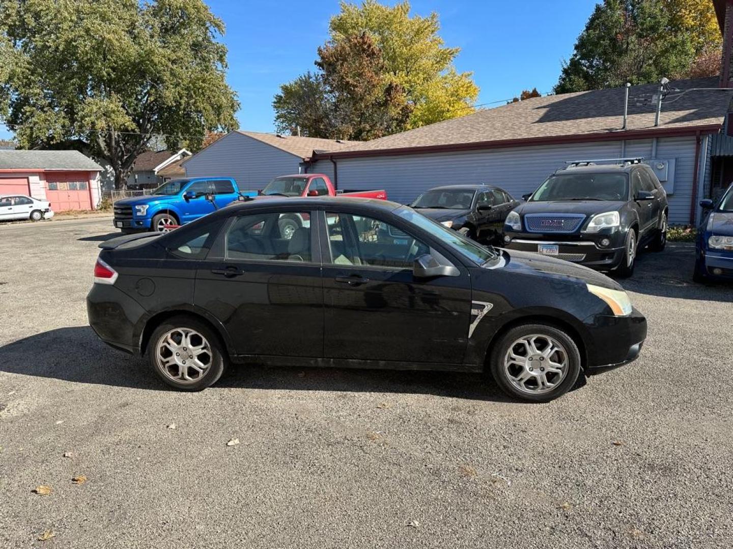 2008 BLACK FORD FOCUS SE (1FAHP35N08W) with an 2.0L engine, Automatic transmission, located at 1708 Broadway, Rockford, IL, 61104, (815) 397-5010, 42.252522, -89.069359 - Photo#2