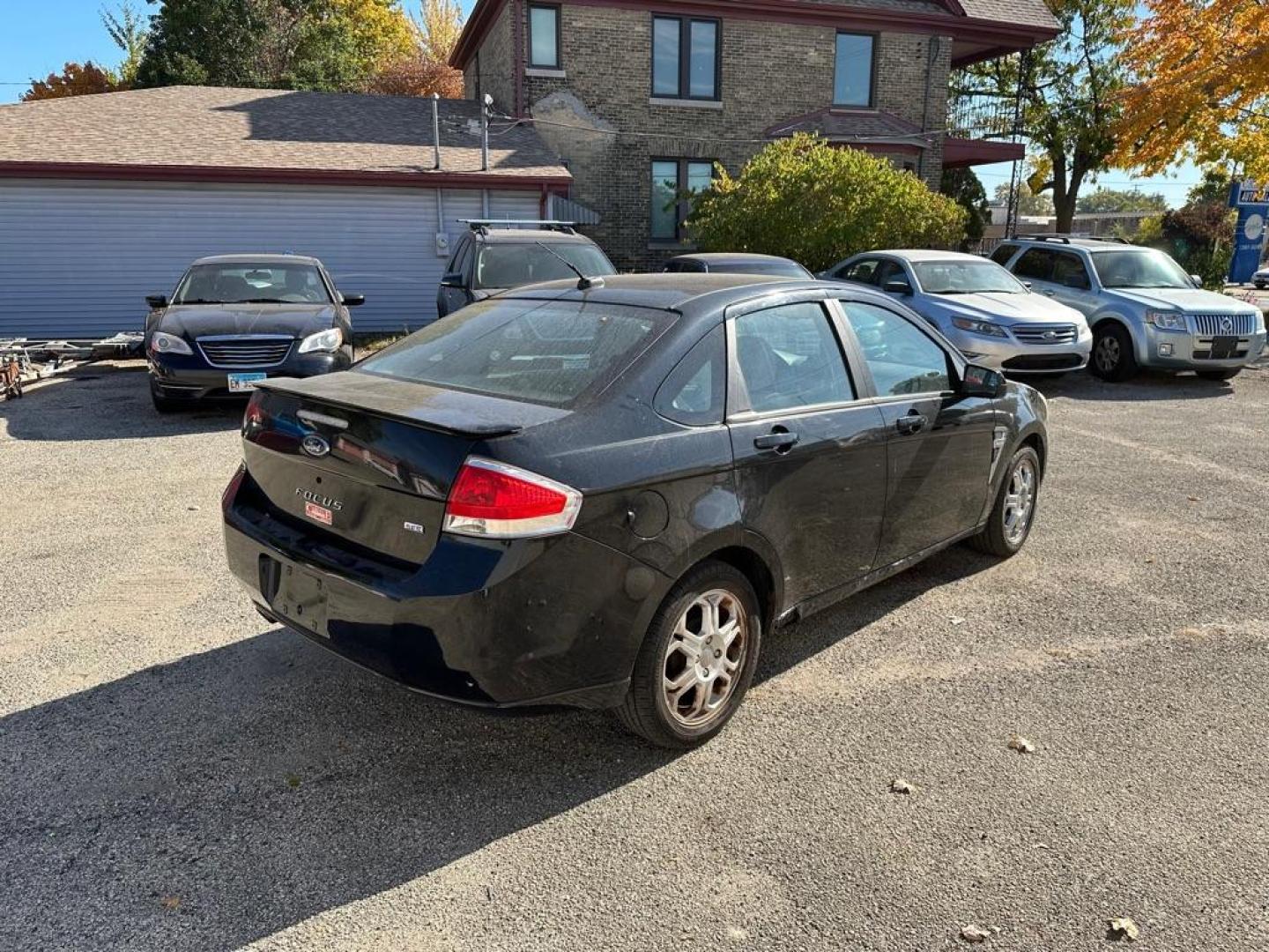 2008 BLACK FORD FOCUS SE (1FAHP35N08W) with an 2.0L engine, Automatic transmission, located at 1708 Broadway, Rockford, IL, 61104, (815) 397-5010, 42.252522, -89.069359 - Photo#3