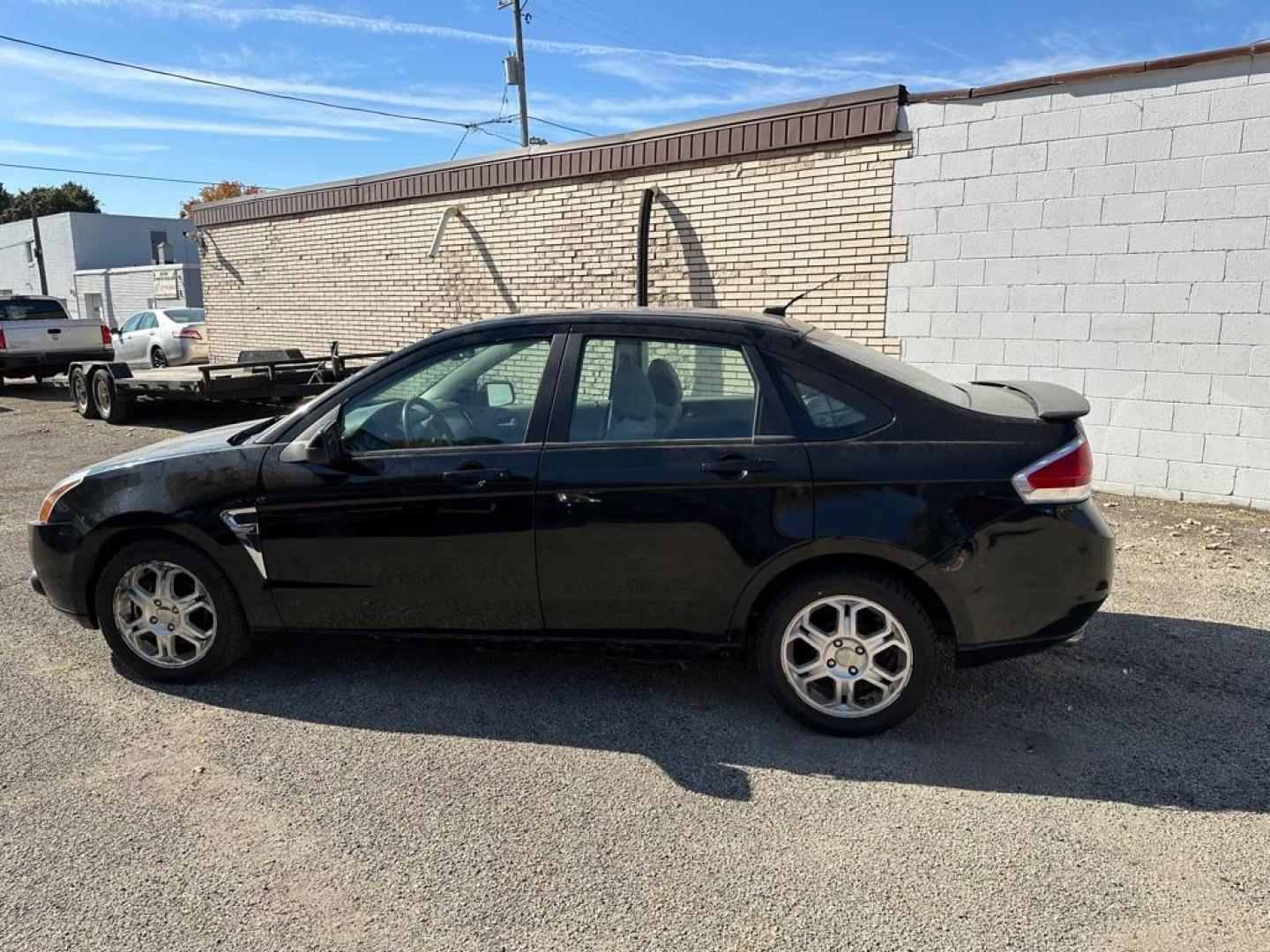 2008 BLACK FORD FOCUS SE (1FAHP35N08W) with an 2.0L engine, Automatic transmission, located at 1708 Broadway, Rockford, IL, 61104, (815) 397-5010, 42.252522, -89.069359 - Photo#6