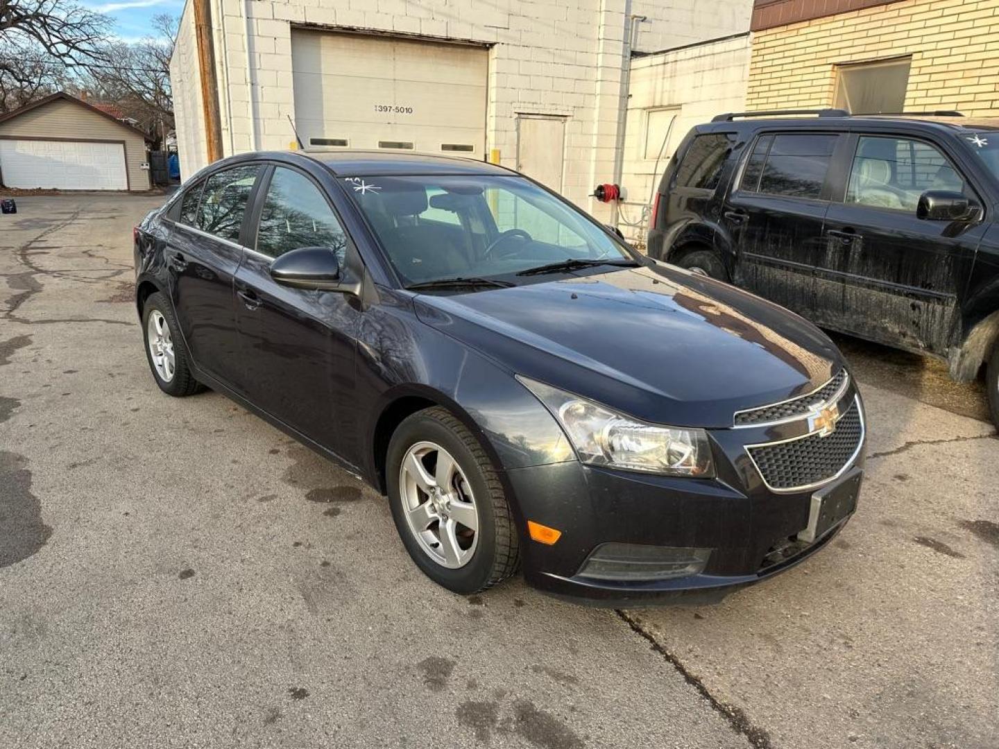 2014 BLUE CHEVROLET CRUZE LT (1G1PC5SB4E7) with an 1.4L engine, Automatic transmission, located at 1708 Broadway, Rockford, IL, 61104, (815) 397-5010, 42.252522, -89.069359 - Photo#1