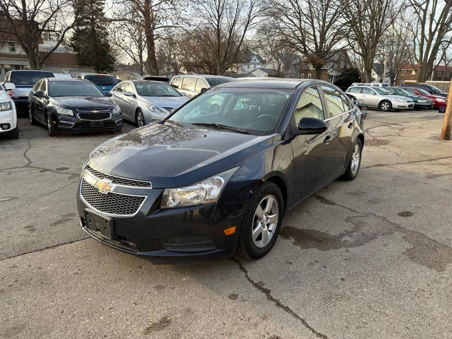 2014 BLUE CHEVROLET CRUZE LT (1G1PC5SB4E7) with an 1.4L engine, Automatic transmission, located at 1708 Broadway, Rockford, IL, 61104, (815) 397-5010, 42.252522, -89.069359 - Photo#0