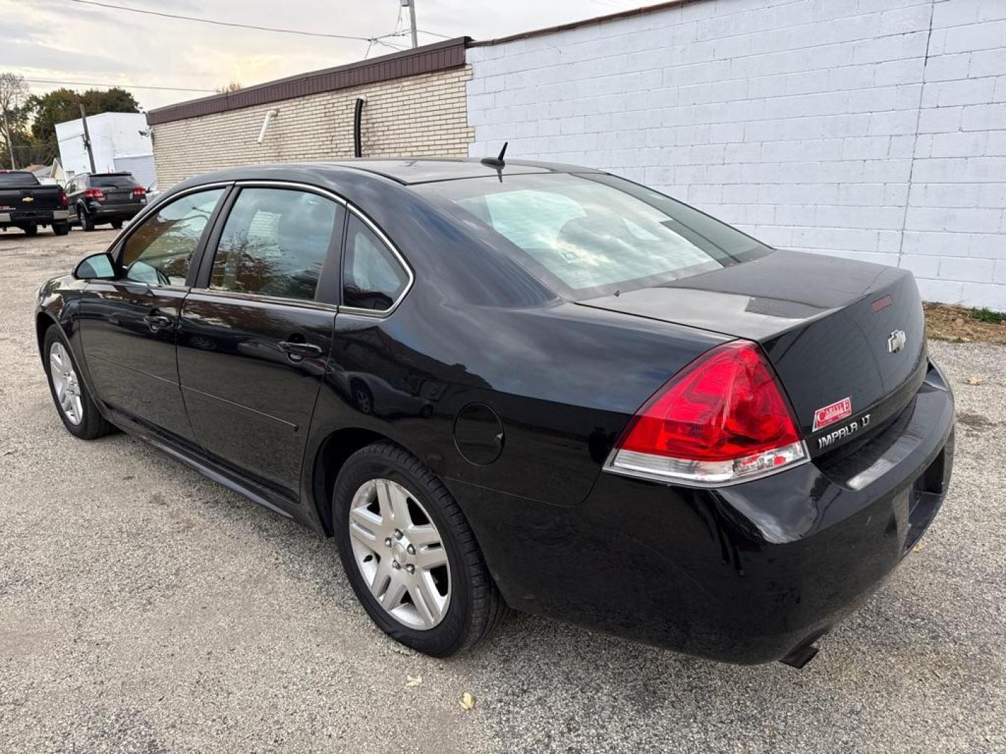 2012 BLACK CHEVROLET IMPALA LT (2G1WG5E3XC1) with an 3.6L engine, Automatic transmission, located at 1708 Broadway, Rockford, IL, 61104, (815) 397-5010, 42.252522, -89.069359 - Photo#3
