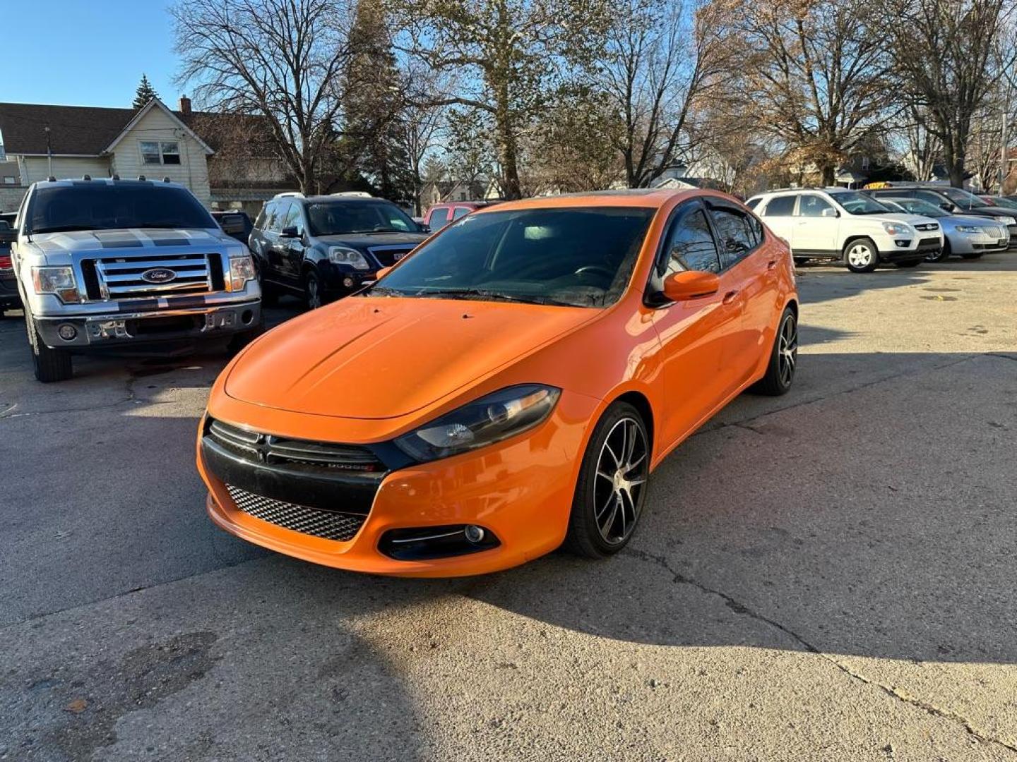 2014 ORANGE DODGE DART GT (1C3CDFEB4ED) with an 2.4L engine, Automatic transmission, located at 1708 Broadway, Rockford, IL, 61104, (815) 397-5010, 42.252522, -89.069359 - Photo#0