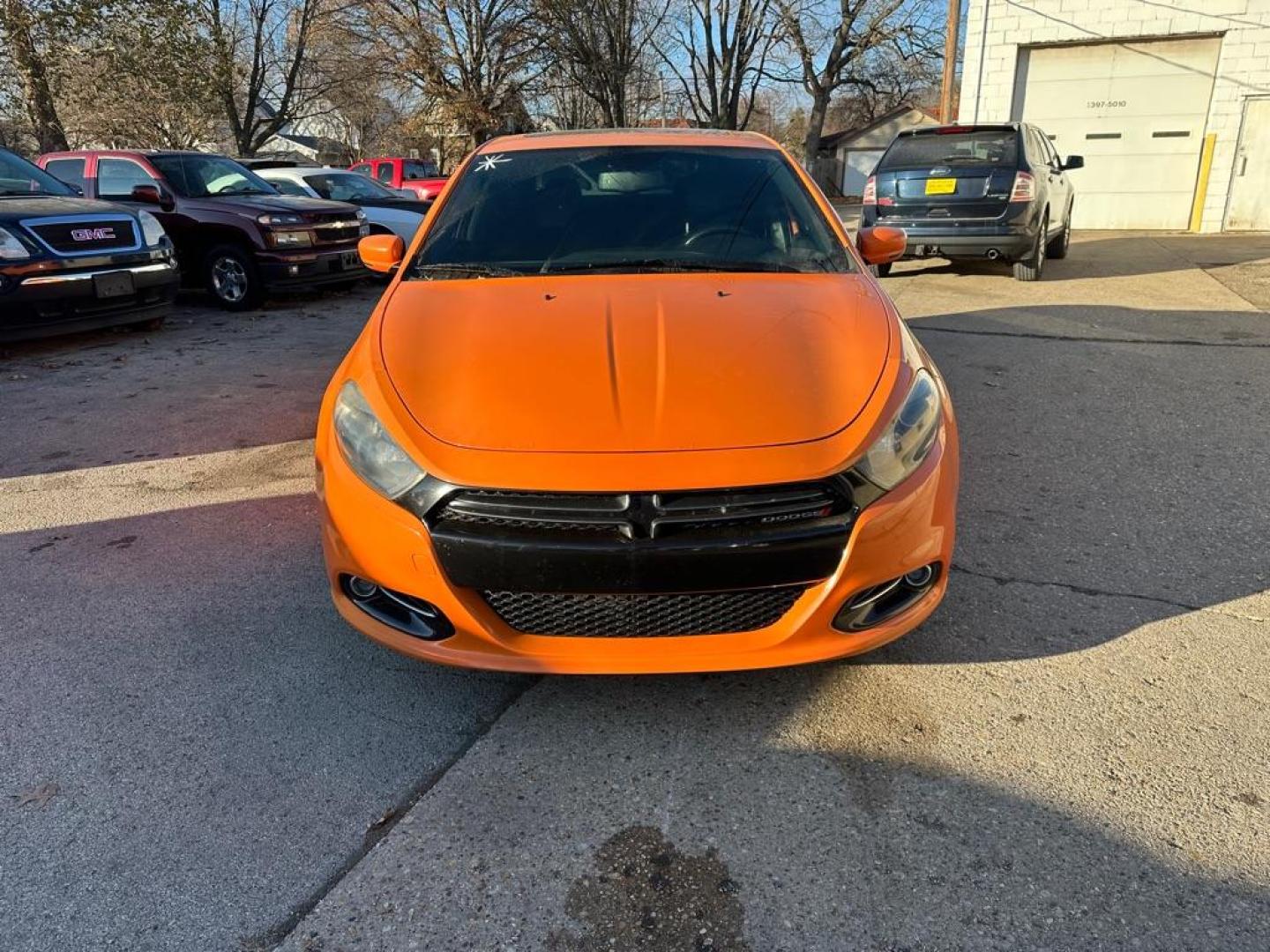 2014 ORANGE DODGE DART GT (1C3CDFEB4ED) with an 2.4L engine, Automatic transmission, located at 1708 Broadway, Rockford, IL, 61104, (815) 397-5010, 42.252522, -89.069359 - Photo#1