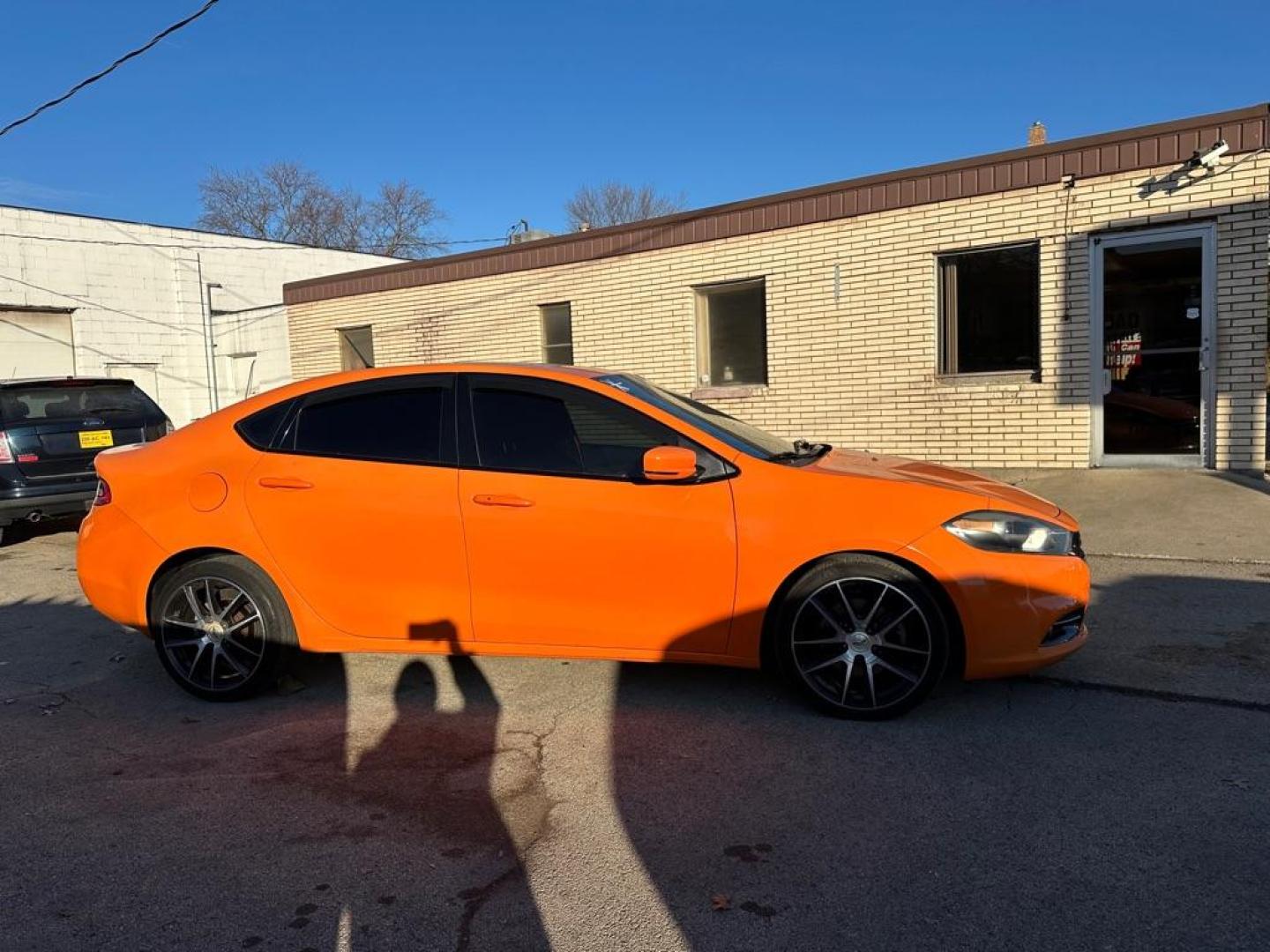 2014 ORANGE DODGE DART GT (1C3CDFEB4ED) with an 2.4L engine, Automatic transmission, located at 1708 Broadway, Rockford, IL, 61104, (815) 397-5010, 42.252522, -89.069359 - Photo#3