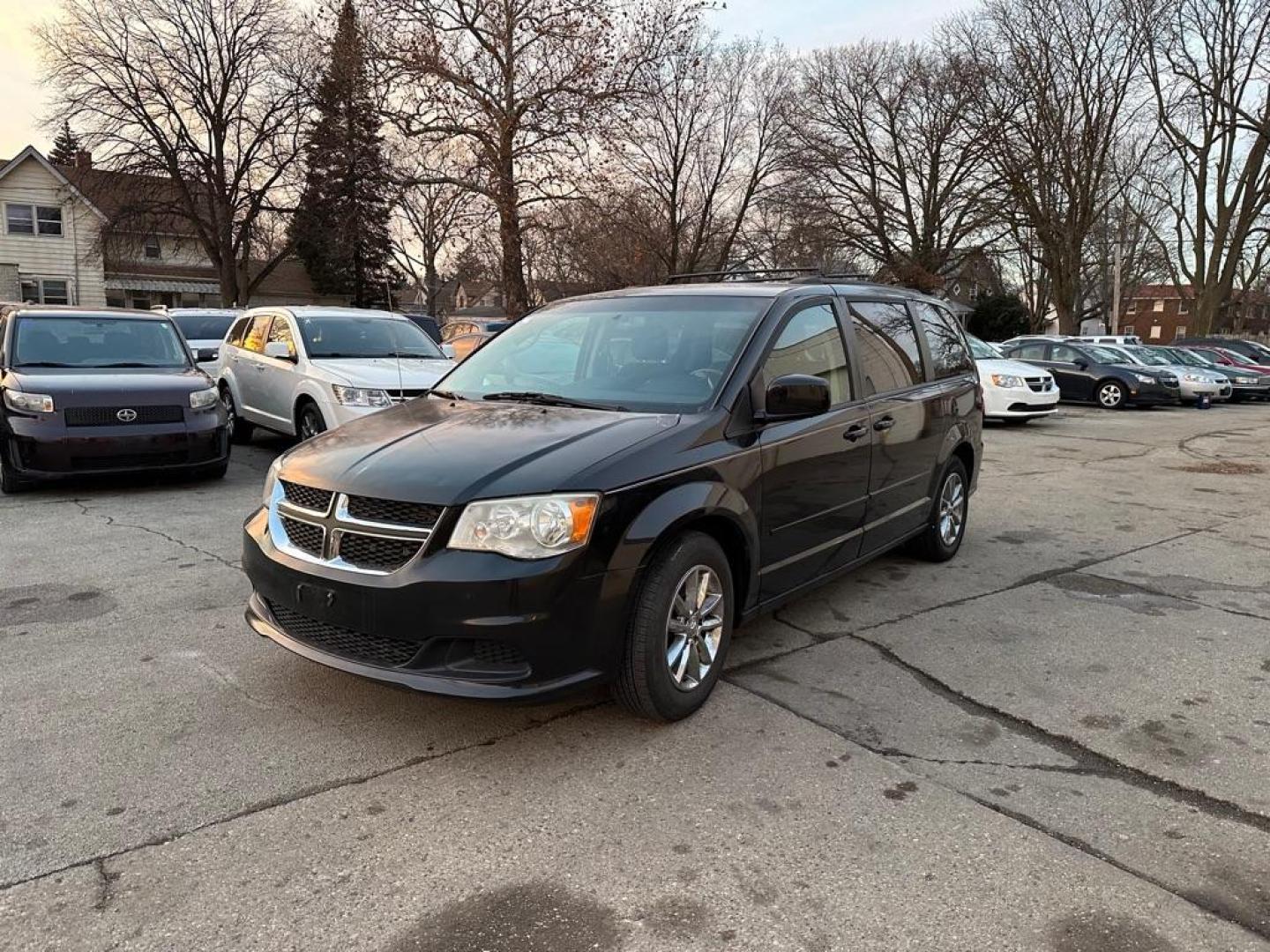2015 BLACK DODGE GRAND CARAVAN SXT (2C4RDGCGXFR) with an 3.6L engine, Automatic transmission, located at 1708 Broadway, Rockford, IL, 61104, (815) 397-5010, 42.252522, -89.069359 - Photo#0