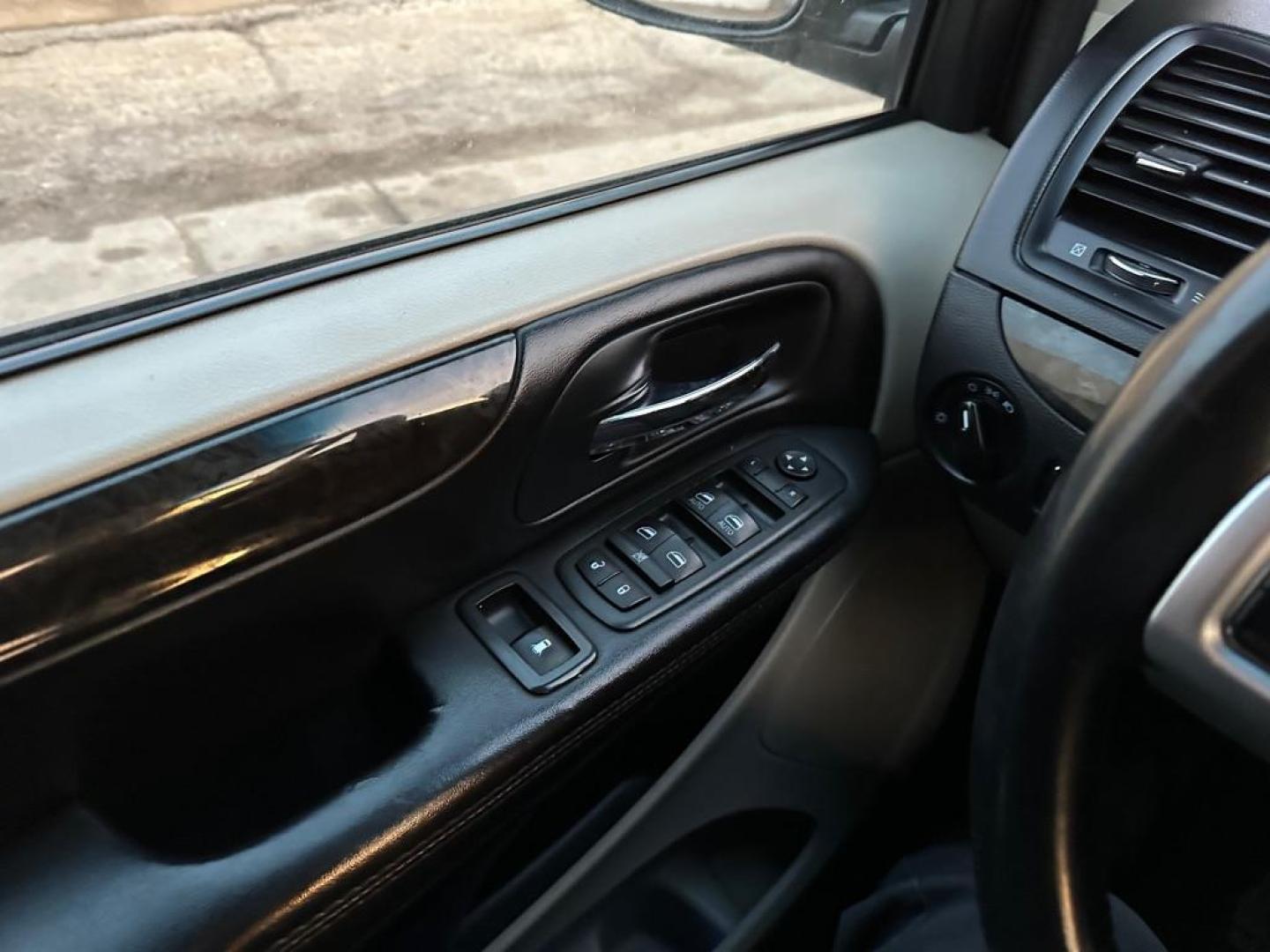 2015 BLACK DODGE GRAND CARAVAN SXT (2C4RDGCGXFR) with an 3.6L engine, Automatic transmission, located at 1708 Broadway, Rockford, IL, 61104, (815) 397-5010, 42.252522, -89.069359 - Photo#10