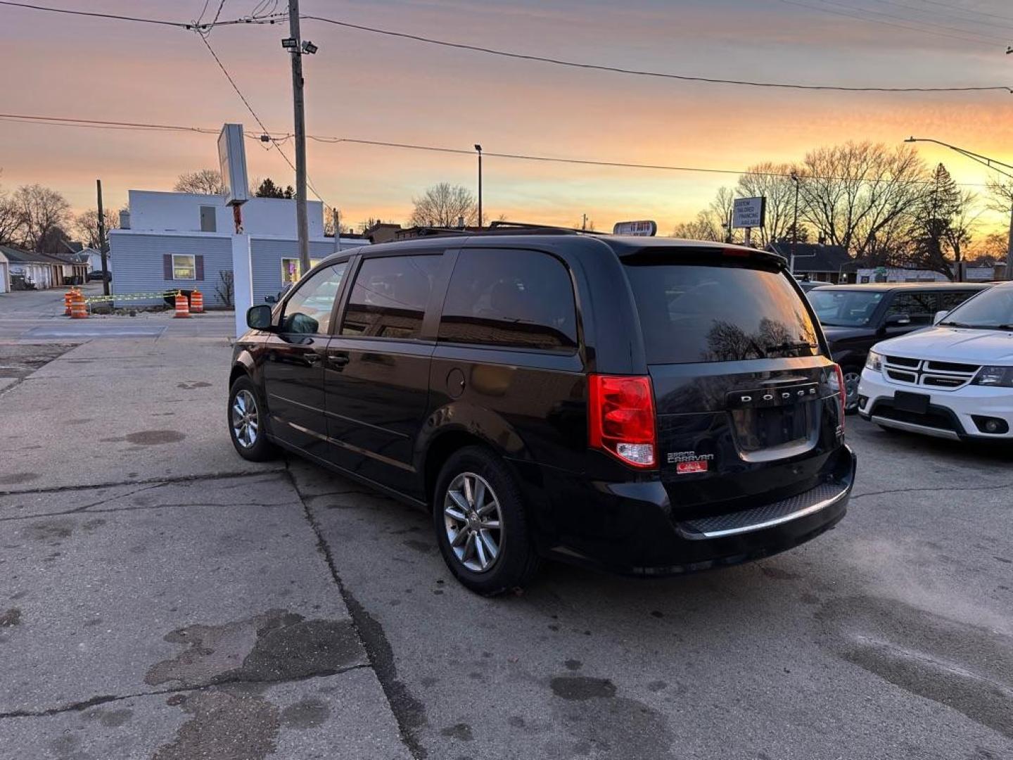 2015 BLACK DODGE GRAND CARAVAN SXT (2C4RDGCGXFR) with an 3.6L engine, Automatic transmission, located at 1708 Broadway, Rockford, IL, 61104, (815) 397-5010, 42.252522, -89.069359 - Photo#3