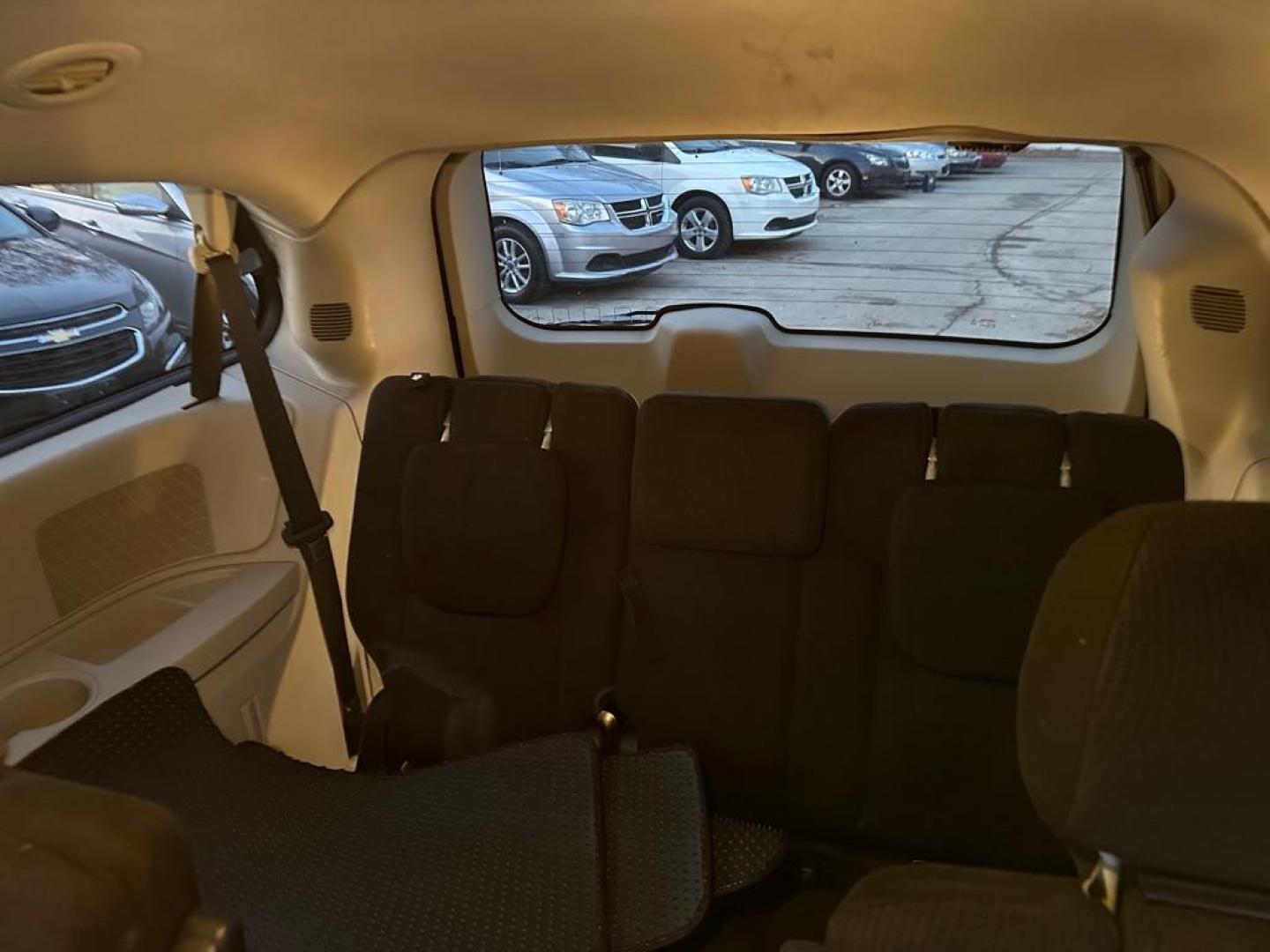 2015 BLACK DODGE GRAND CARAVAN SXT (2C4RDGCGXFR) with an 3.6L engine, Automatic transmission, located at 1708 Broadway, Rockford, IL, 61104, (815) 397-5010, 42.252522, -89.069359 - Photo#5