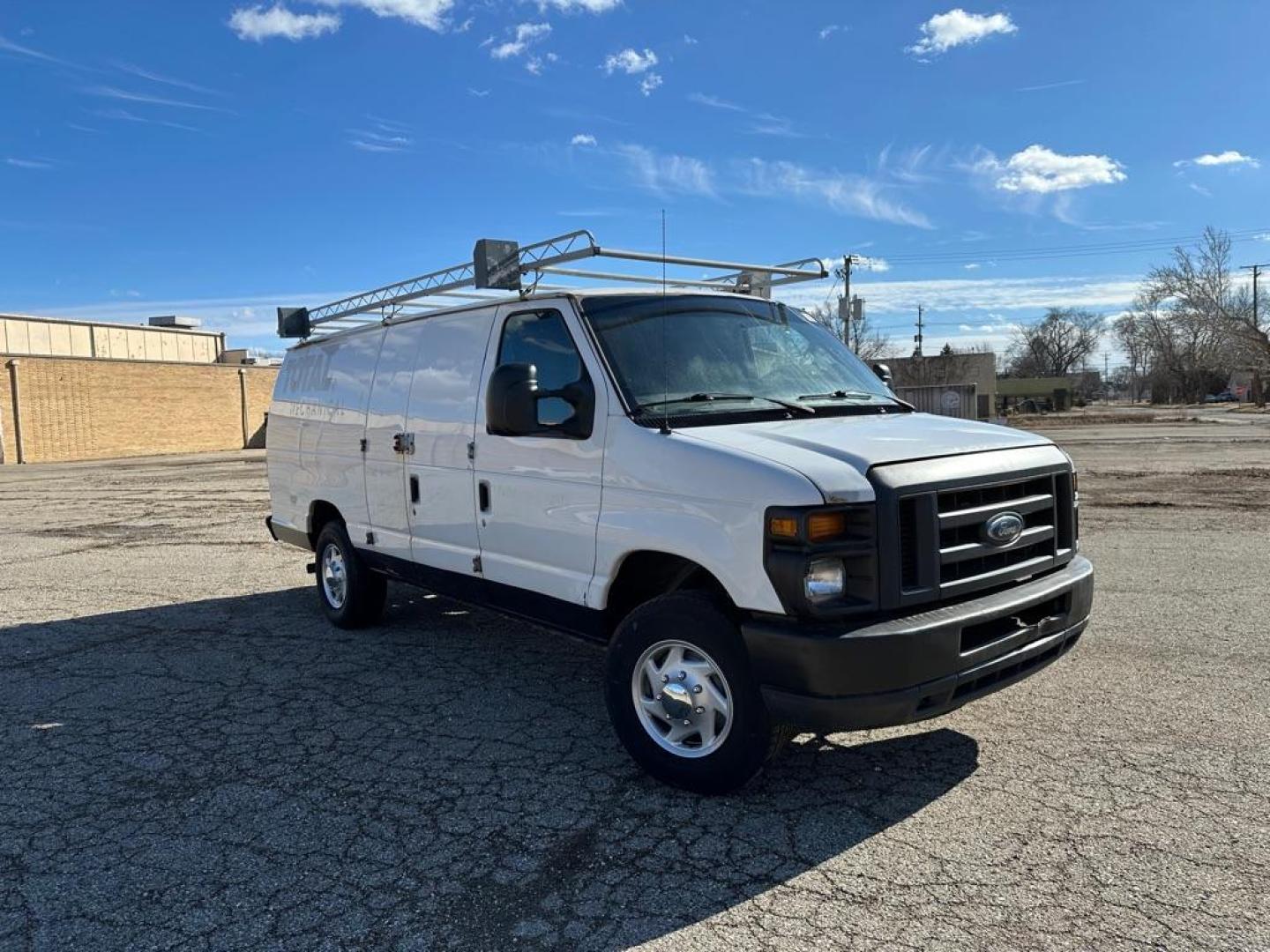 2013 WHITE FORD ECONOLINE E350 SUPER DUTY VAN (1FTSS3EL5DD) with an 5.4L engine, Automatic transmission, located at 1708 Broadway, Rockford, IL, 61104, (815) 397-5010, 42.252522, -89.069359 - Photo#2