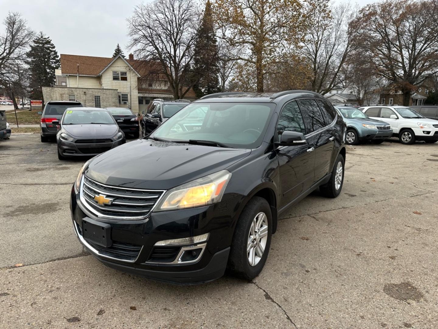 2013 BLACK CHEVROLET TRAVERSE LT (1GNKVGKD1DJ) with an 3.6L engine, Automatic transmission, located at 1708 Broadway, Rockford, IL, 61104, (815) 397-5010, 42.252522, -89.069359- Photo#0
